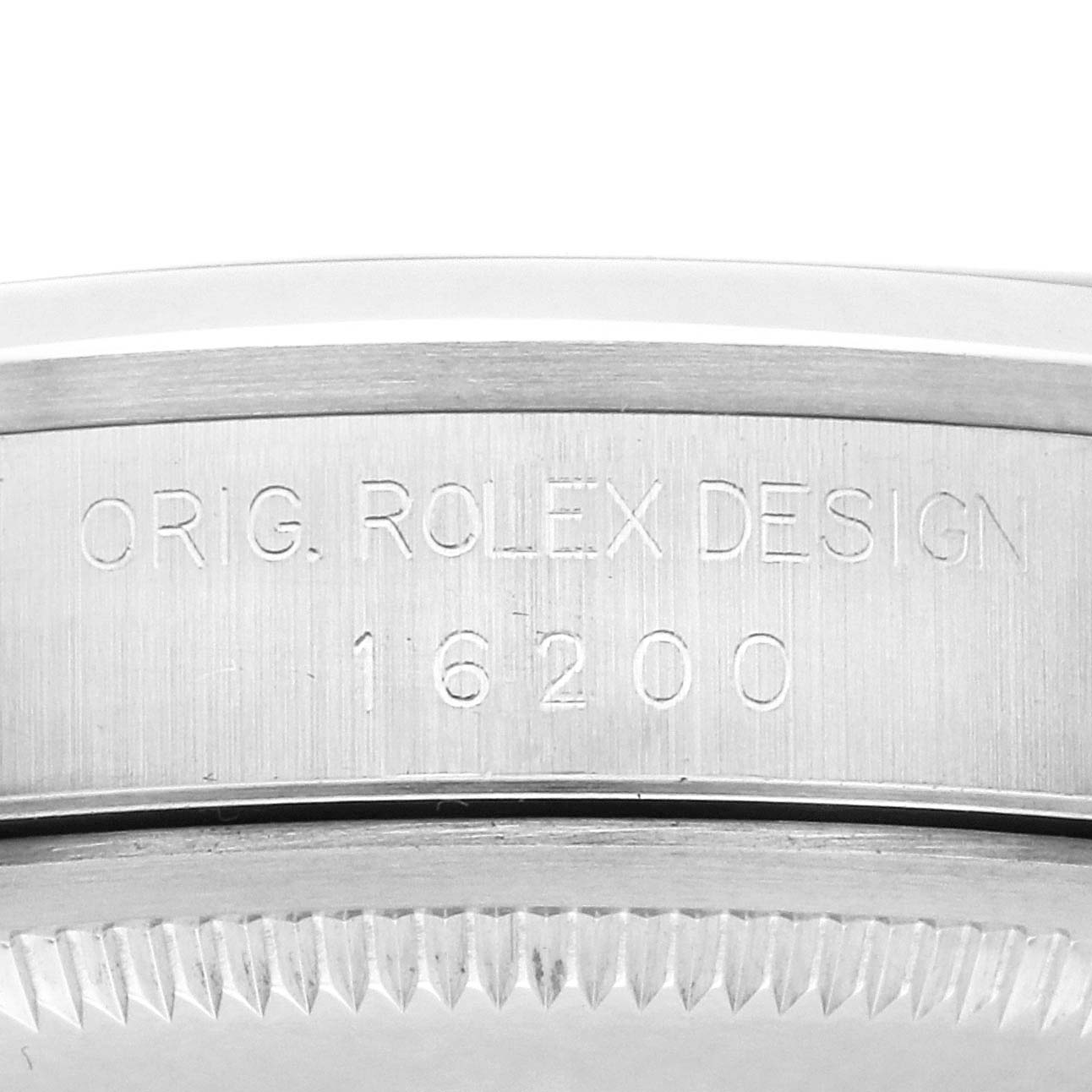 The image shows the engraved side of the bezel on a Rolex Datejust 16200 Men's Stainless Steel White Dial 16200 Men's Stainless Steel White Dial with model number "16200."