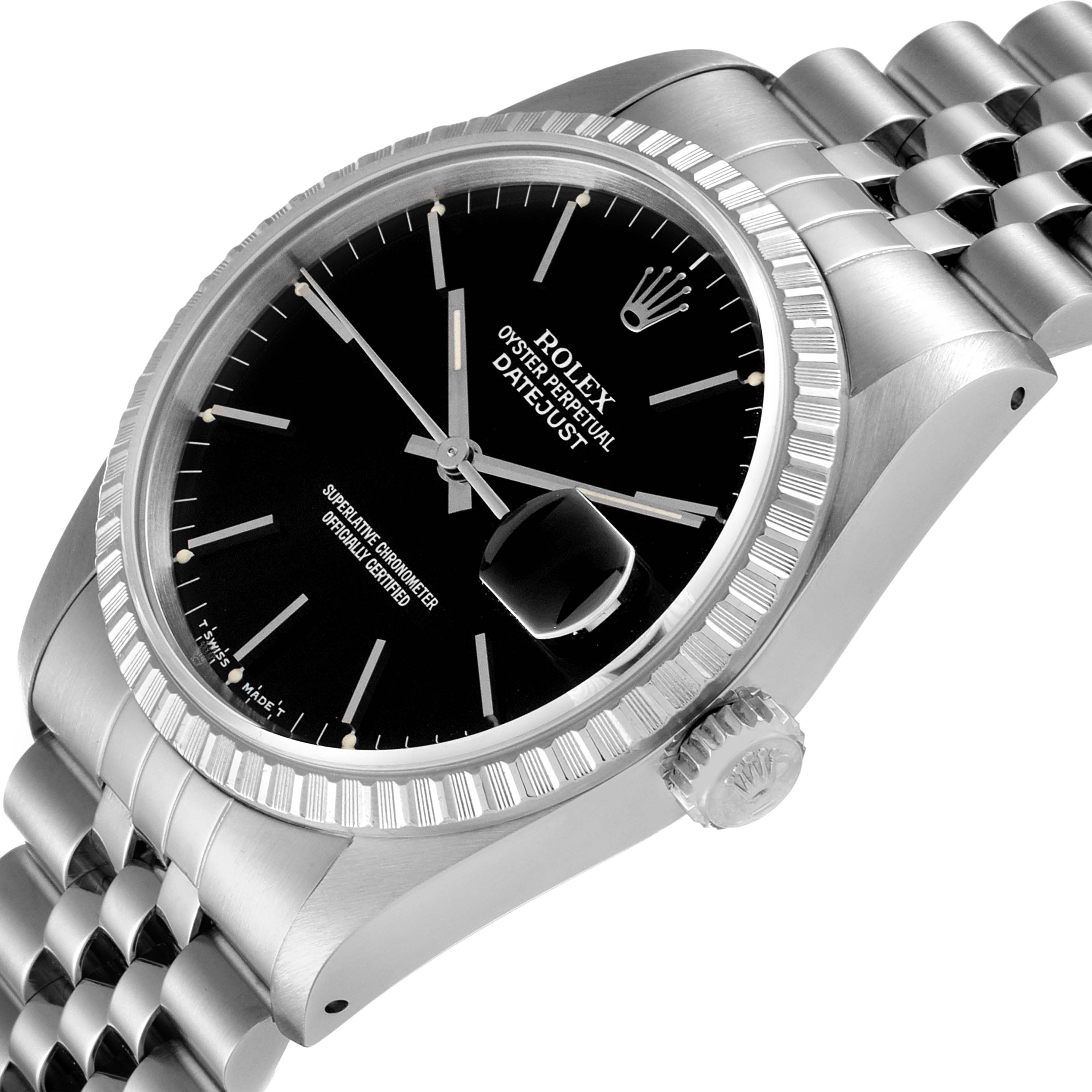 This image shows a close-up angled view of a Rolex Datejust 16220 Men
s Stainless Steel Black Dial 16220 Men
s Stainless Steel Black Dial watch, showcasing the dial, bezel, crown, and part of the bracelet.