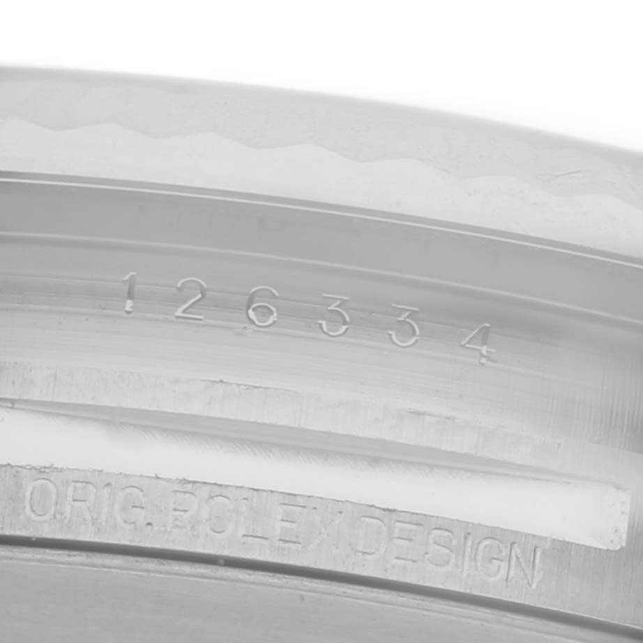 The image shows the serial and model number engraving on the inner rim of the Rolex Datejust 41 126334 Men's Stainless Steel Grey Dial 126334 Men's Stainless Steel Grey Dial's case.