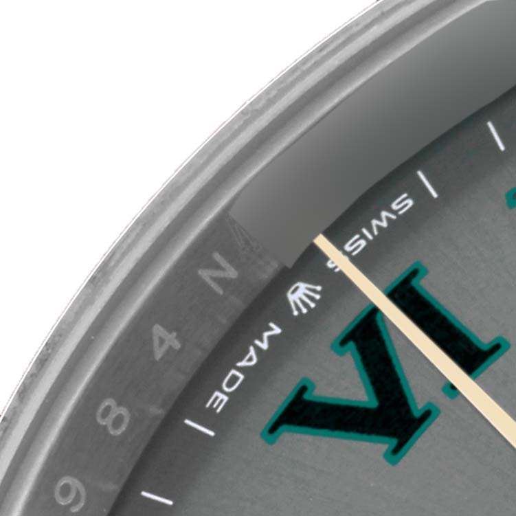 This close-up shows the dial edge and part of the bezel of the Rolex Datejust 41 126333 Men's Steel and Gold (two tone) Grey Dial 126333 Men's Steel and Gold (two tone) Grey Dial, highlighting markers and the "Swiss Made" text.
