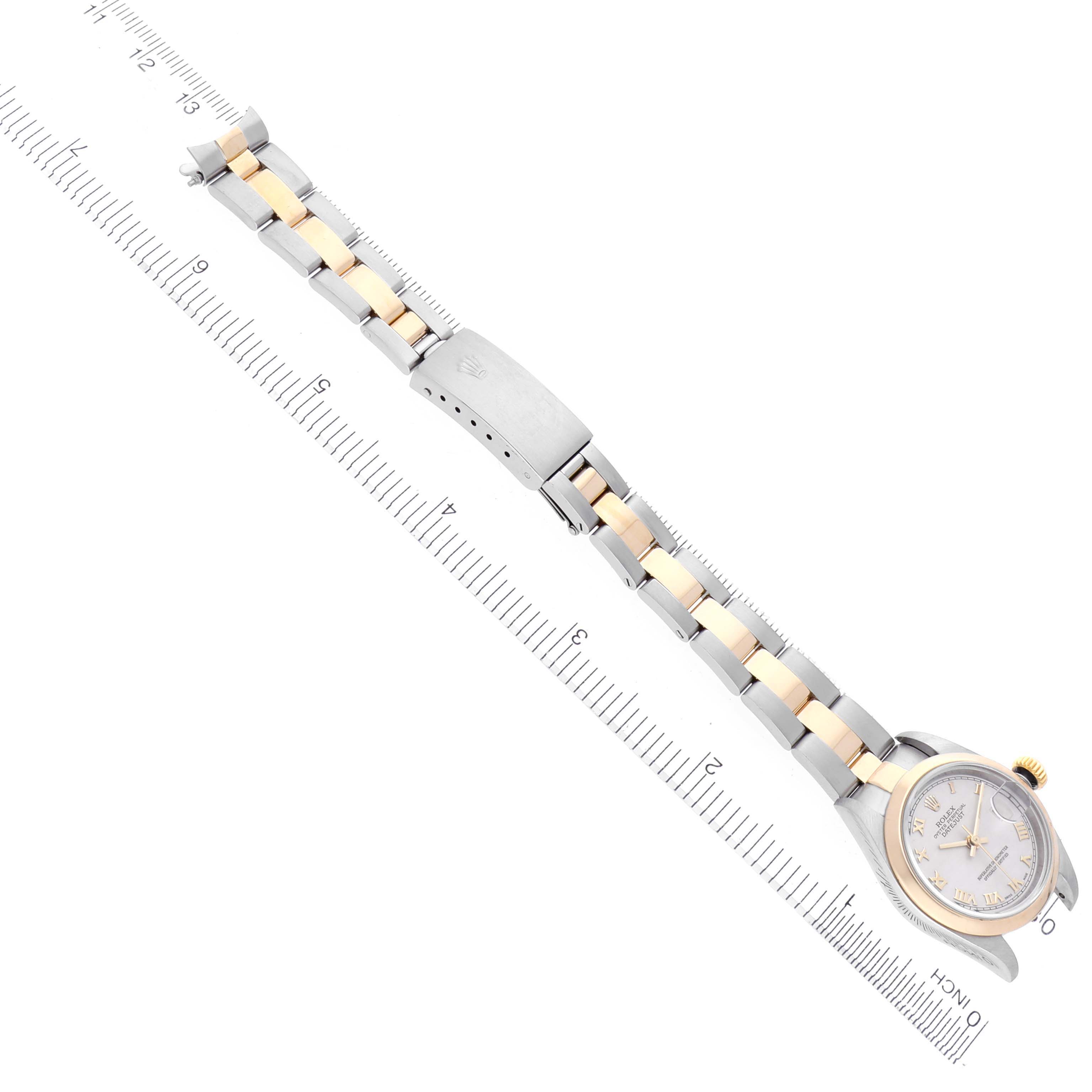 The Rolex Datejust 79163 Women's Steel and Gold (two tone) White Dial 79163 Women's Steel and Gold (two tone) White Dial watch is shown at a slight diagonal angle displaying the full bracelet and part of the dial.