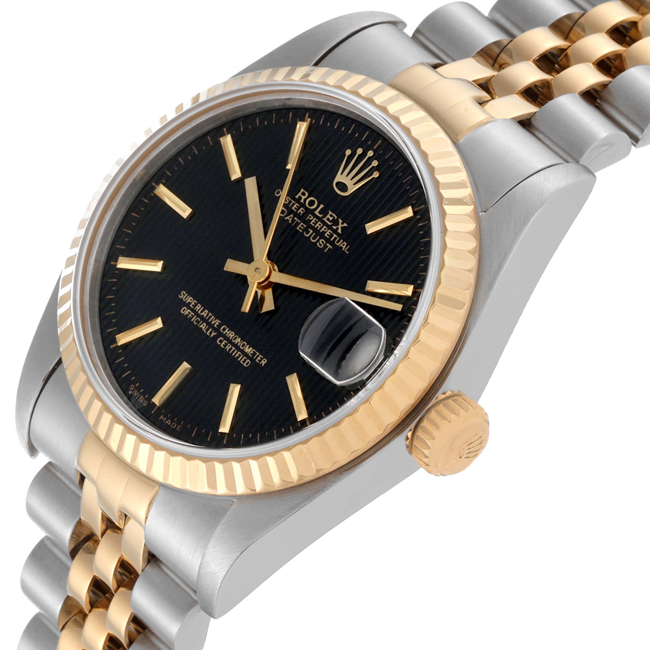 The image shows a Rolex Mid-Size 68273 Women's Steel and Gold (two tone) Black Dial 68273 Women's Steel and Gold (two tone) Black Dial Datejust watch at a slight angle, displaying the dial, fluted bezel, and part of the bracelet.