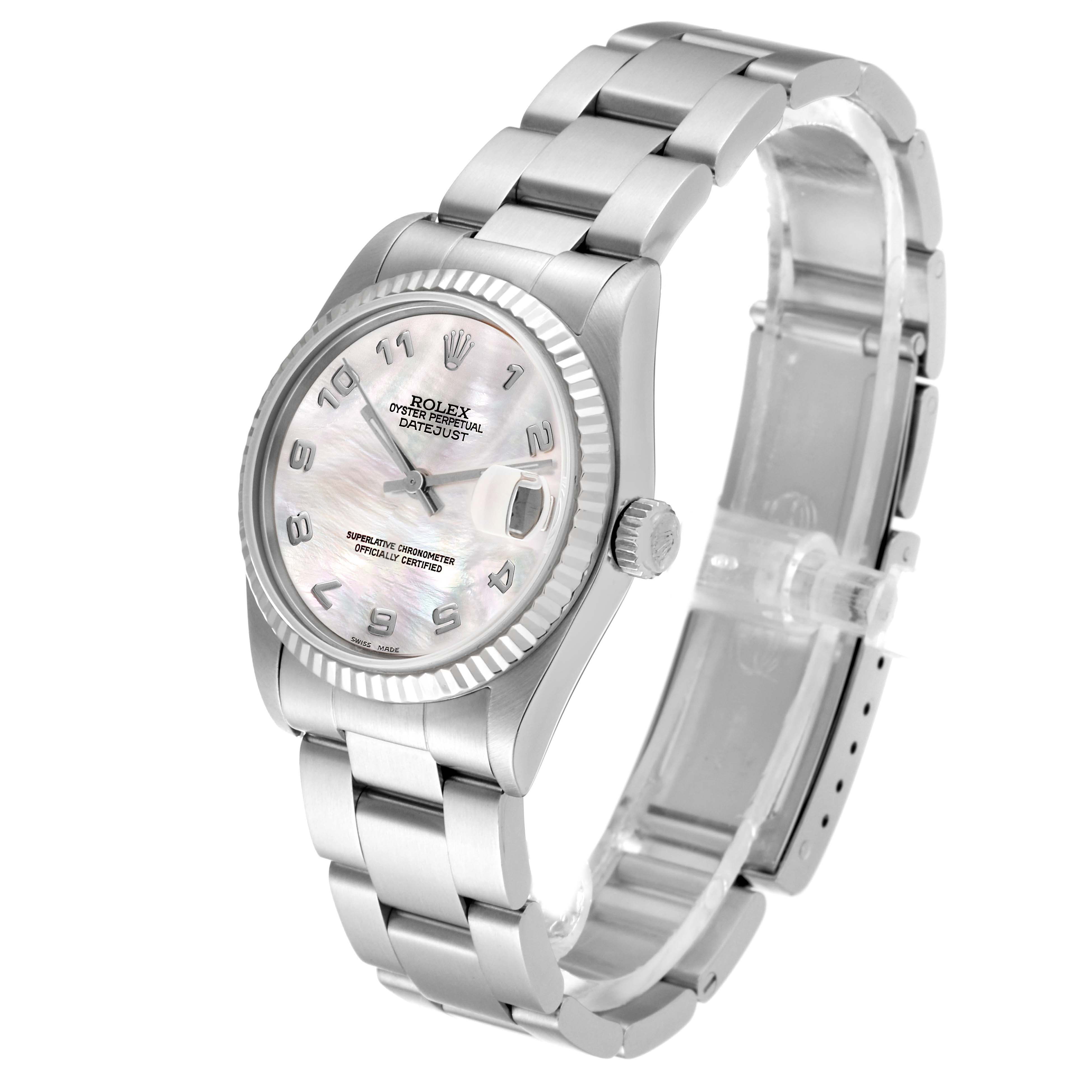 The Rolex Mid-Size 68274 Women's Stainless Steel Mother of Pearl Dial 68274 Women's Stainless Steel Mother of Pearl Dial Oyster Perpetual Datejust watch is shown at an angle displaying the face, crown, bracelet, and clasp.