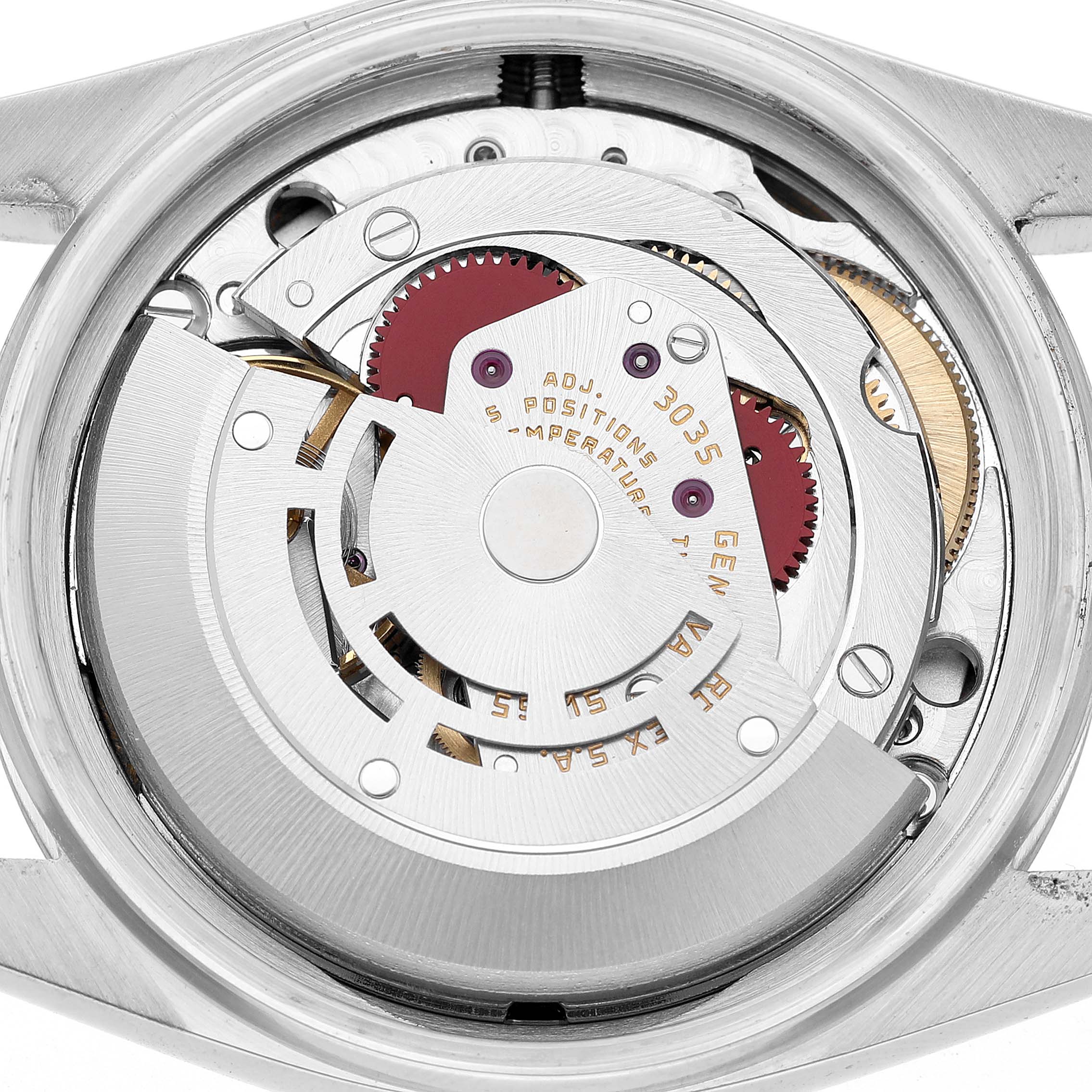 The image shows the movement of a Rolex Datejust 16014 Men's Stainless Steel Silver Dial model from the back, highlighting gears and rotor.