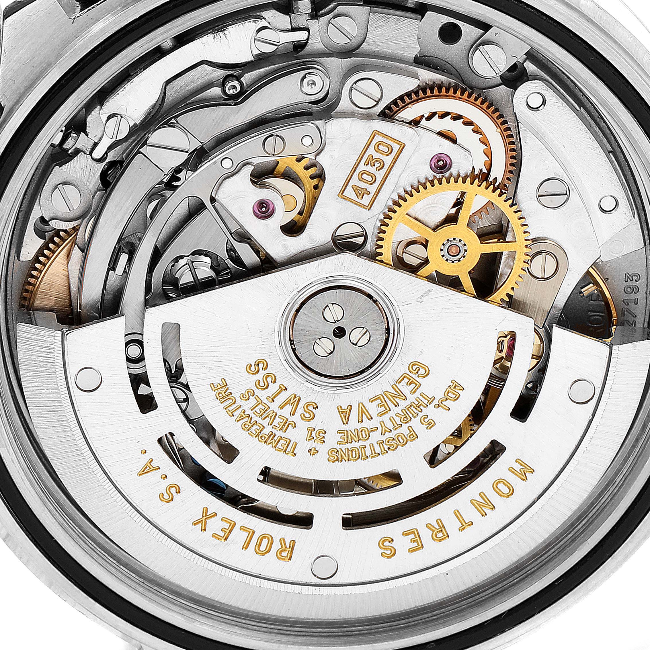 The image shows a close-up of the movement and internal mechanisms of a Rolex Daytona 16523 Men's Steel and Gold (two tone) White Dial 16523 Men's Steel and Gold (two tone) White Dial watch.