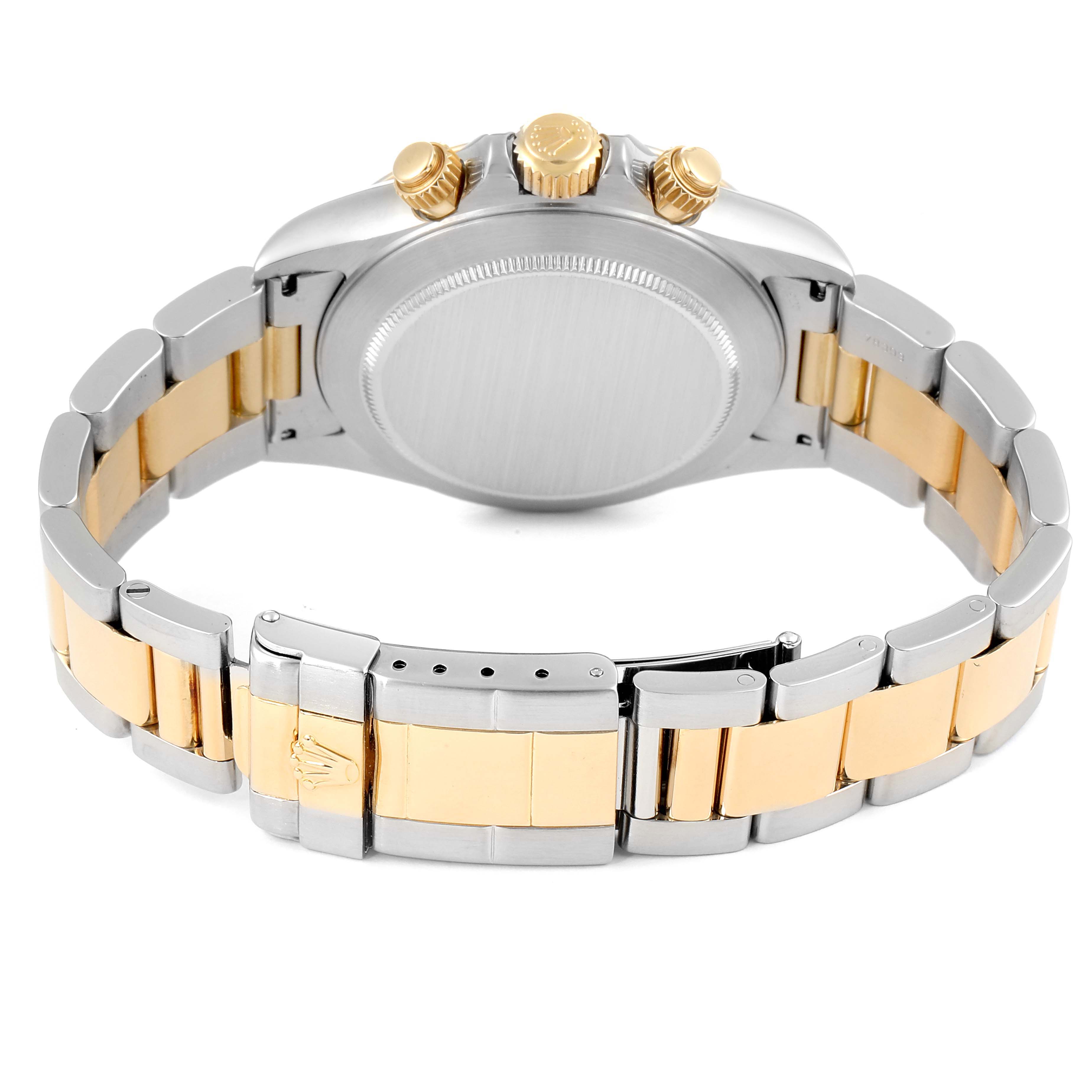 The image shows the back case and bracelet of a Rolex Daytona 16523 Men
s Steel and Gold (two tone) White Dial 16523 Men
s Steel and Gold (two tone) White Dial watch at a rear angle, highlighting its two-tone metal design.