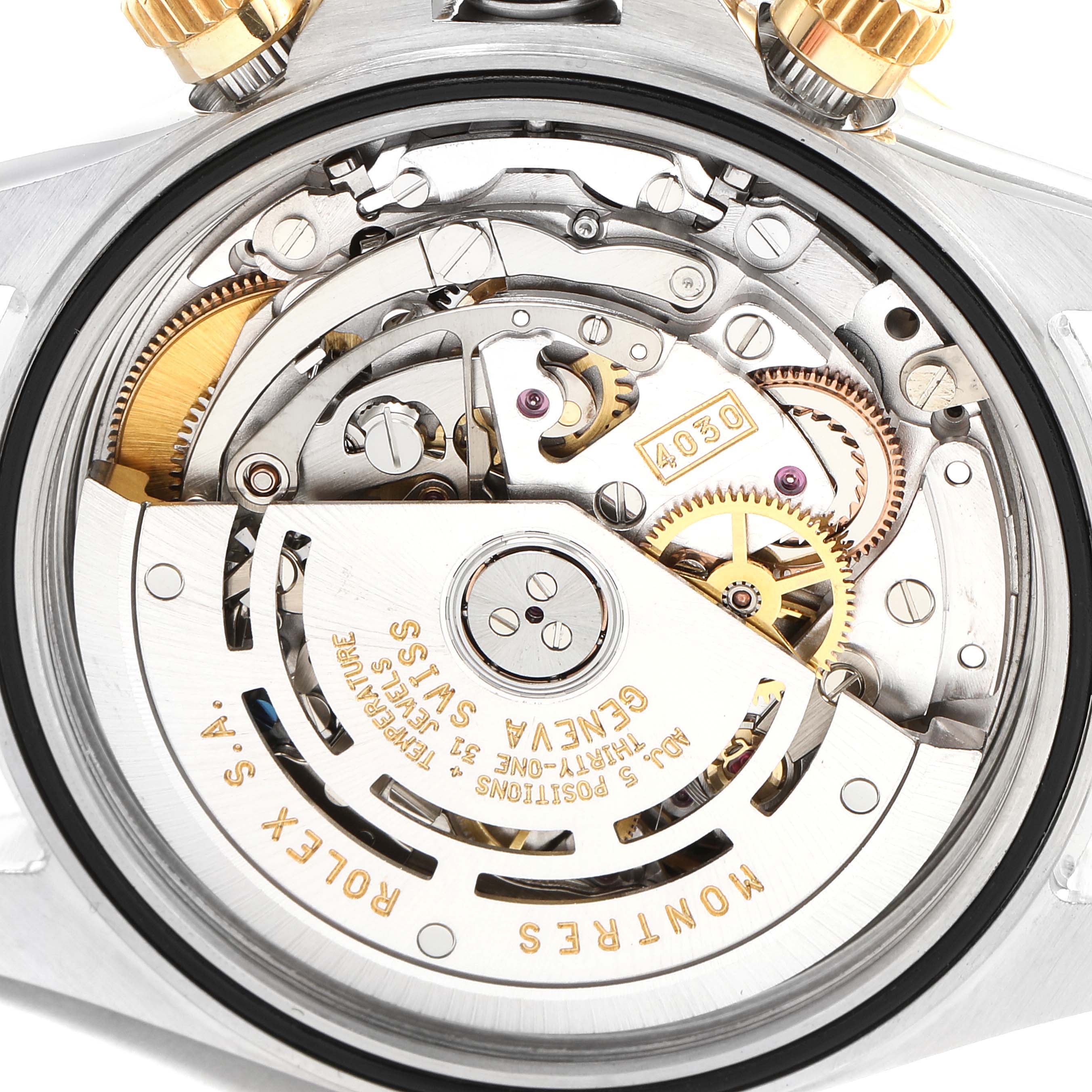 The image shows the intricate internal mechanism of a Rolex Daytona 16523 Men
s Steel and Gold (two tone) White Dial 16523 Men
s Steel and Gold (two tone) White Dial watch, viewed from the back.
