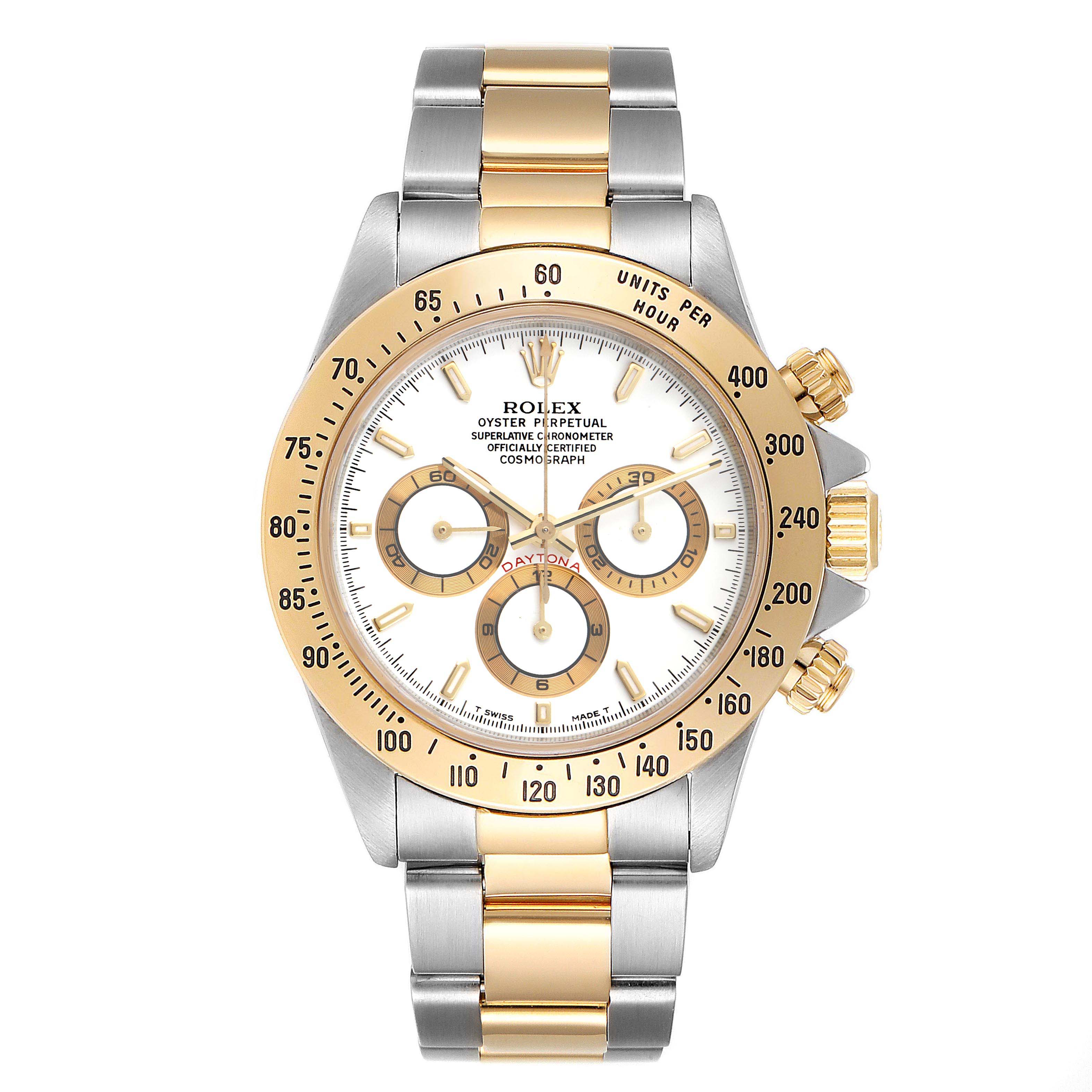 The image shows a front view of a Rolex Daytona 16523 Men
s Steel and Gold (two tone) White Dial 16523 Men
s Steel and Gold (two tone) White Dial watch with a two-tone bracelet and a gold bezel with chronograph features.