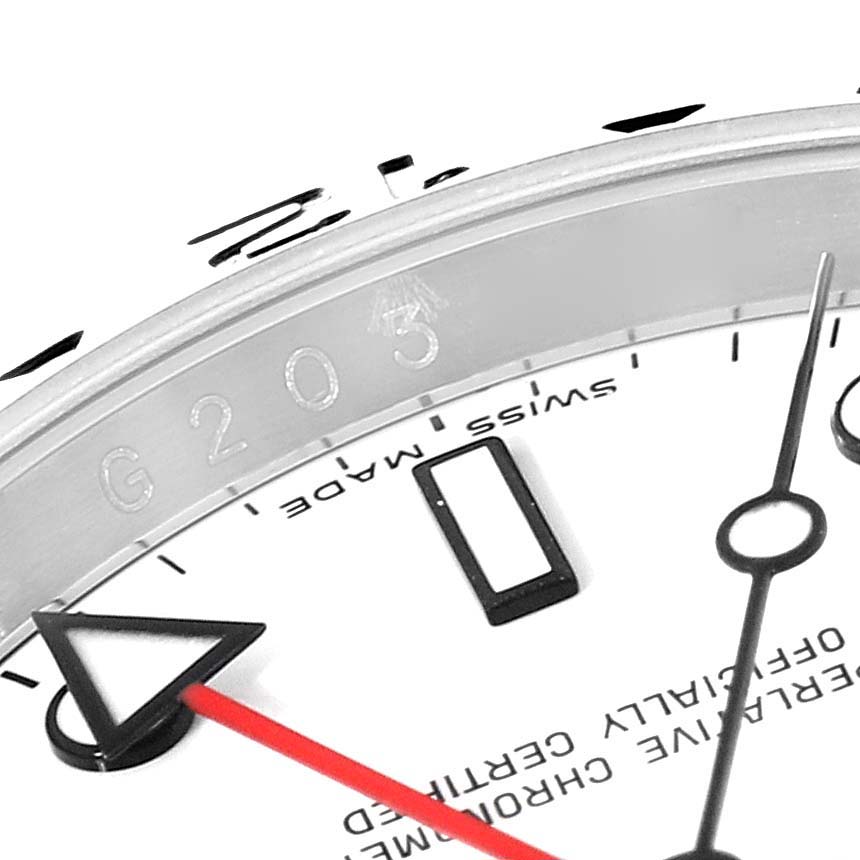 The image shows a close-up angle of the Rolex Explorer 16570 Men
s Stainless Steel White Dial 16570 Men
s Stainless Steel White Dial model watch dial and hands, specifically the hour markers, minute hand, and seconds hand.