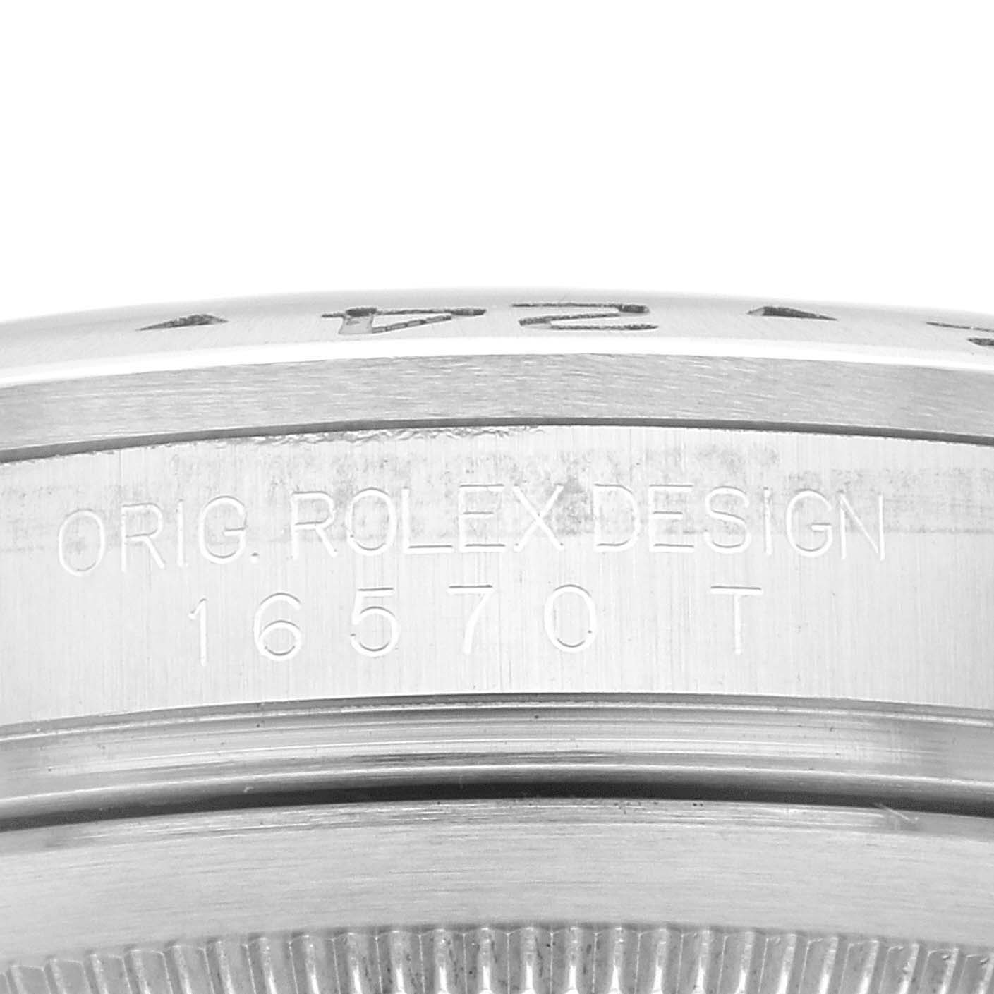 The image shows a close-up of the case side of a Rolex Explorer 16570 Men
s Stainless Steel White Dial 16570 Men
s Stainless Steel White Dial model, displaying the "ORIG. ROLEX DESIGN" and model number 16570T.