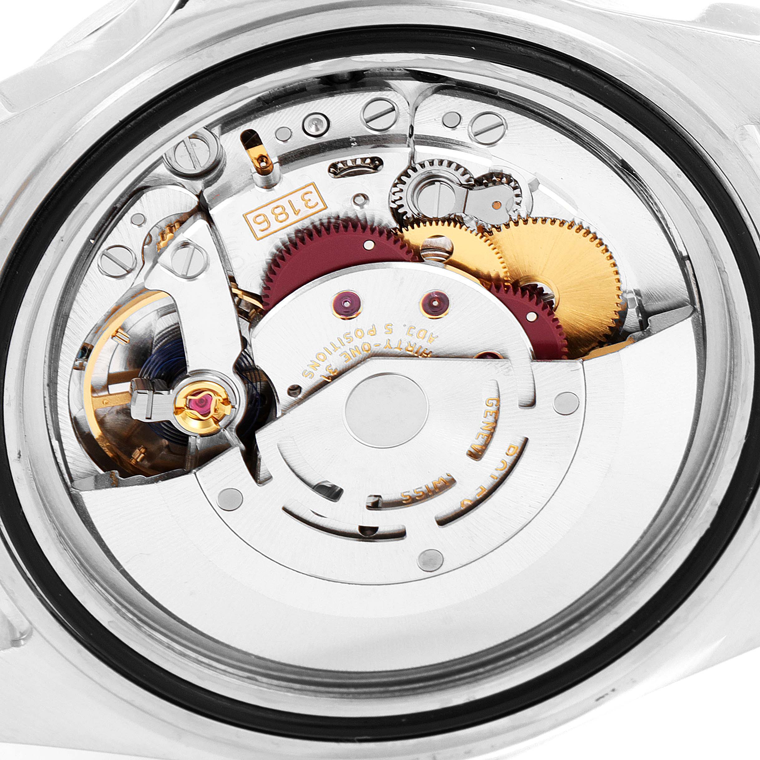 This is an image of the internal mechanism of a Rolex Explorer 16570 Men's Stainless Steel White Dial 16570 Men's Stainless Steel White Dial watch, showing gears and movement components.
