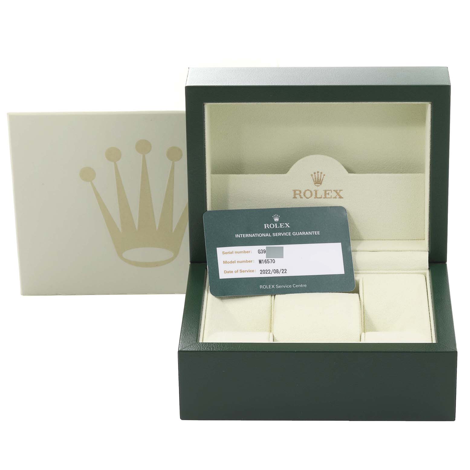 The image shows a Rolex Explorer 16570T Men
s Stainless Steel Black Dial 16570T Men
s Stainless Steel Black Dial model watch box at an angle with an international service guarantee card.