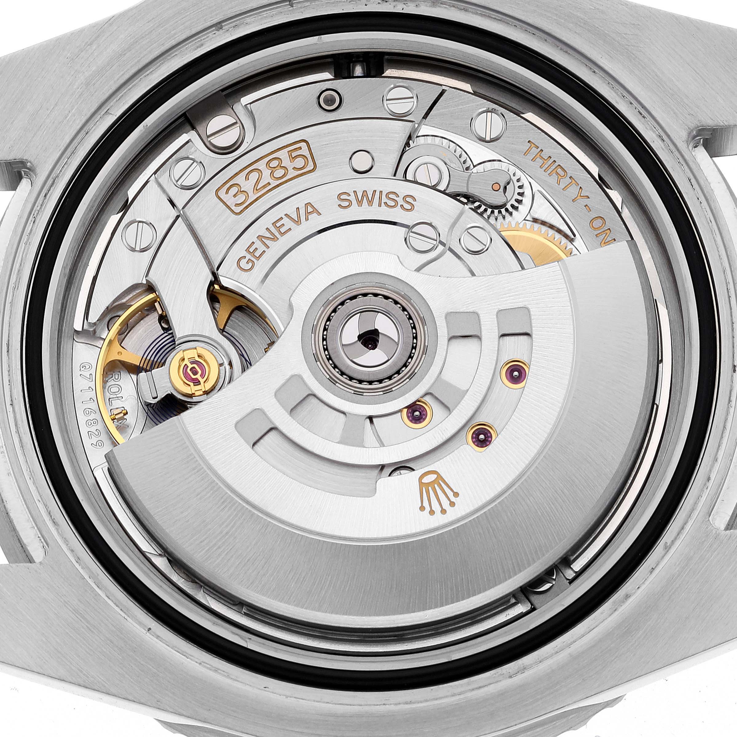 This image shows the detailed movement mechanism of a Rolex GMT-Master 126710BLRO Men's Stainless Steel Black Dial 126710BLRO Men's Stainless Steel Black Dial, featuring the Calibre 3285.