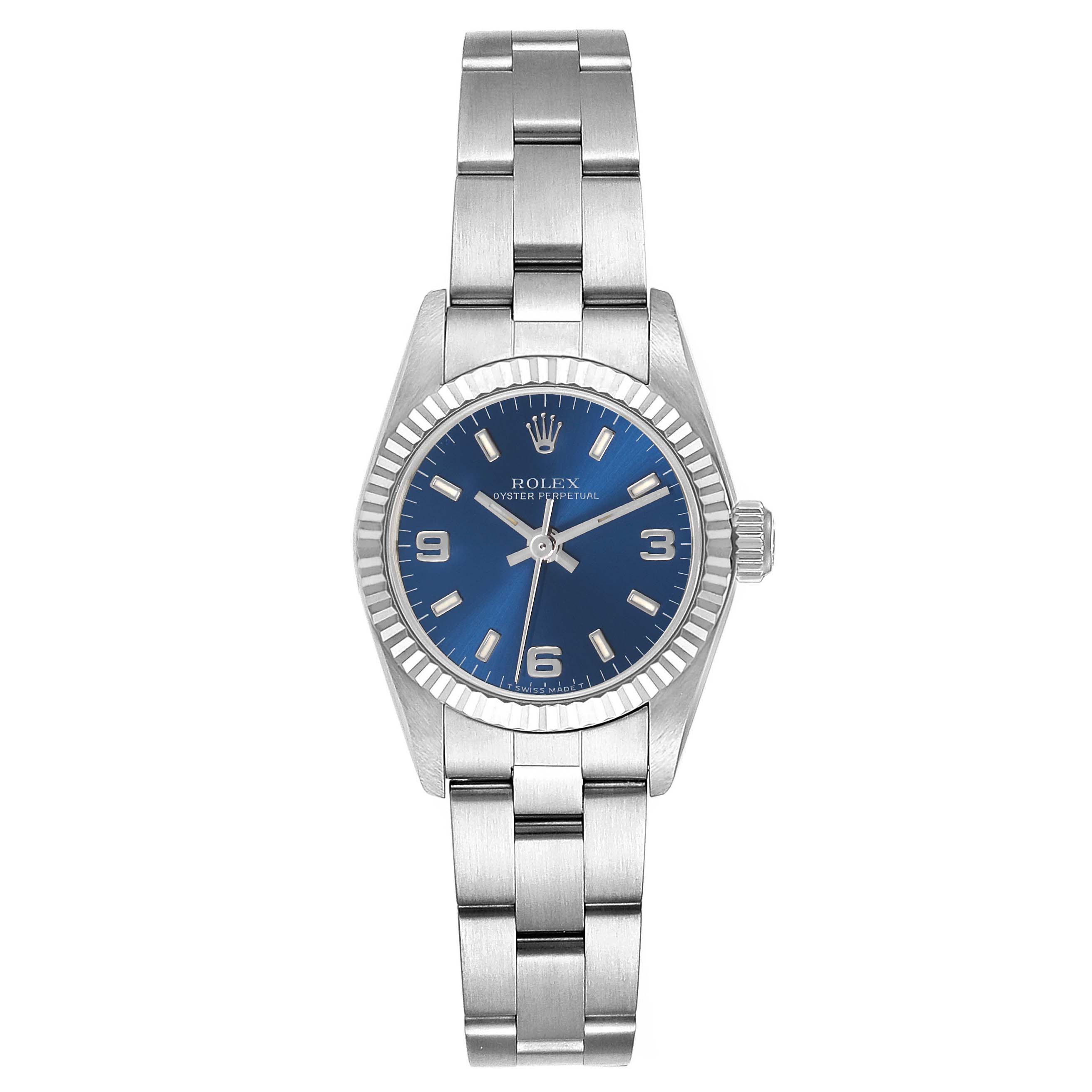 The Rolex Oyster Perpetual 67194 Women's Stainless Steel Blue Dial 67194 Women's Stainless Steel Blue Dial watch is shown from a top-down angle, highlighting the bezel, dial, and bracelet.