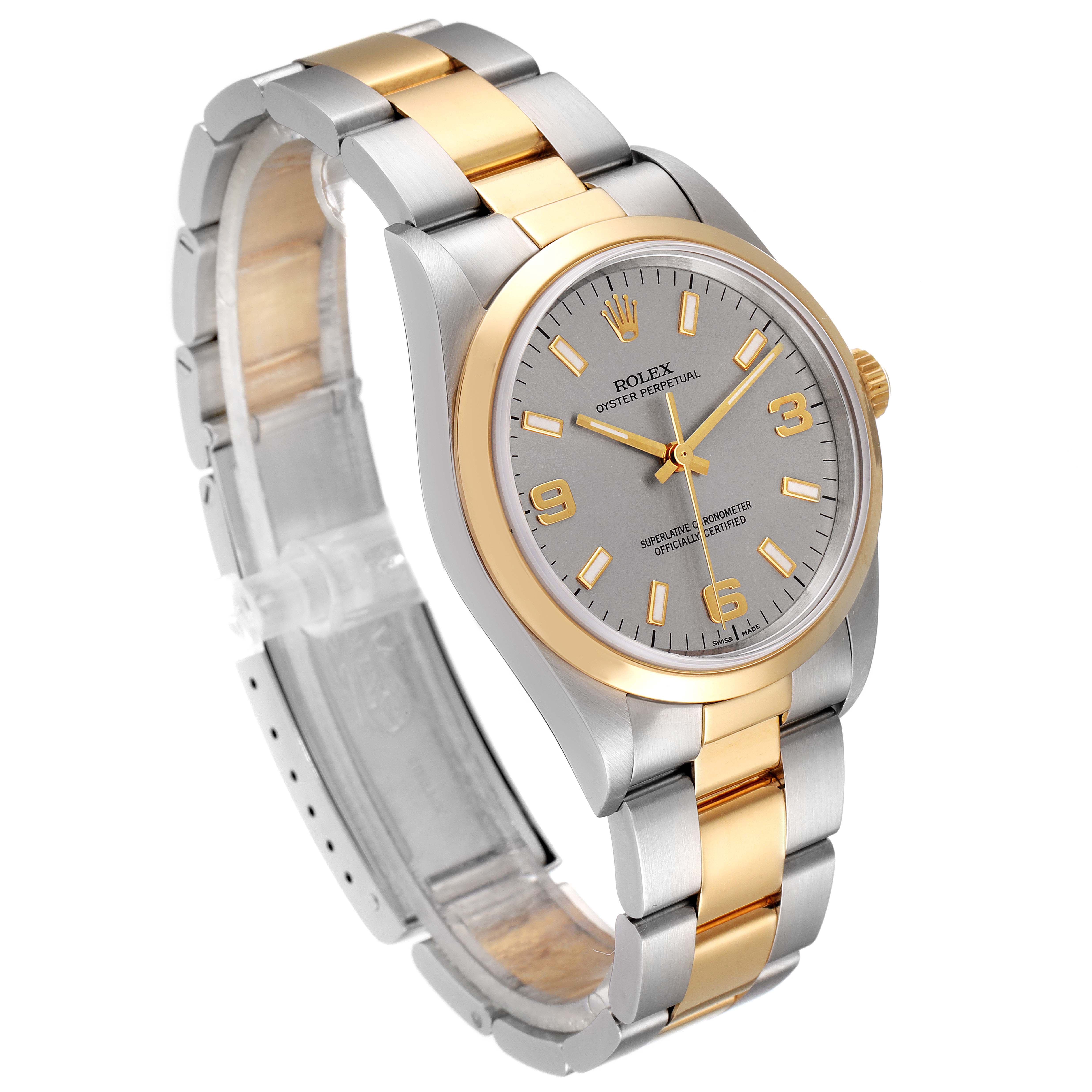 This image shows a Rolex Oyster Perpetual 14203M Men's Steel and Gold (two tone) Grey Dial 14203M Men's Steel and Gold (two tone) Grey Dial watch from a slight side angle, displaying the two-tone bracelet and detailed face.