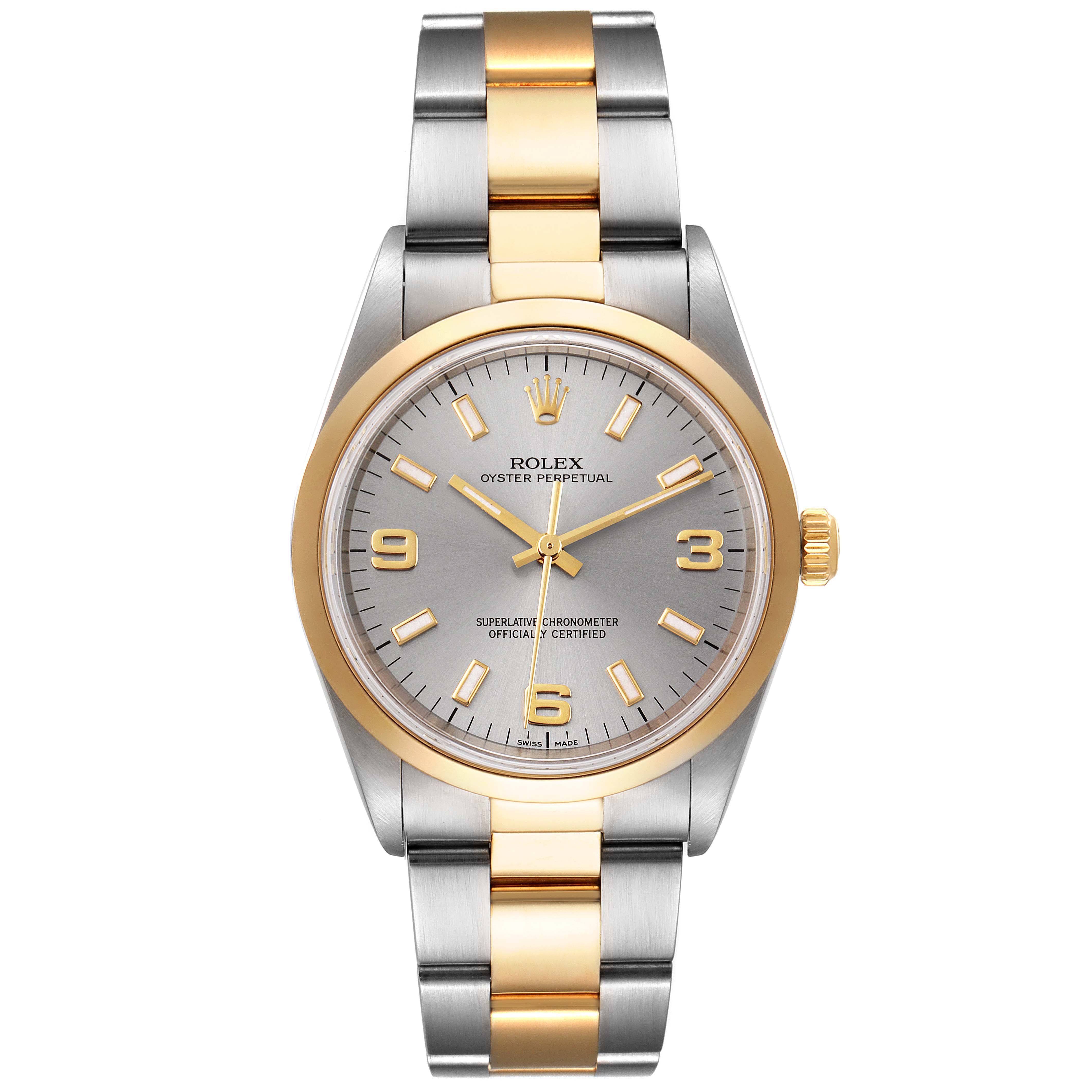 The Rolex Oyster Perpetual 14203M Men's Steel and Gold (two tone) Grey Dial 14203M Men's Steel and Gold (two tone) Grey Dial watch is shown from a top-down view, displaying its dial, bezel, and two-tone bracelet.