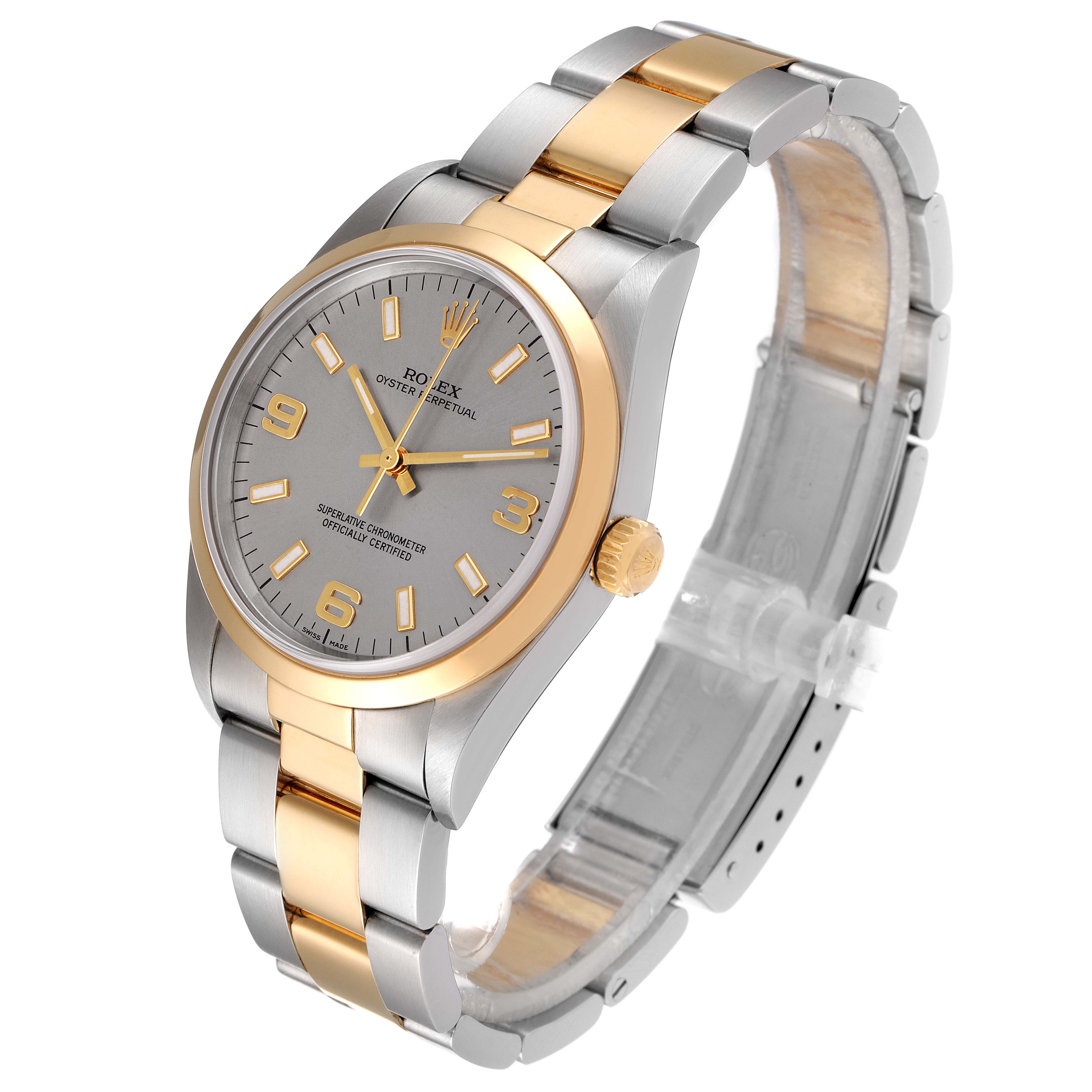 The image shows a Rolex Oyster Perpetual 14203M Men's Steel and Gold (two tone) Grey Dial 14203M Men's Steel and Gold (two tone) Grey Dial watch angled slightly to the left, featuring a two-tone gold and stainless steel bracelet.