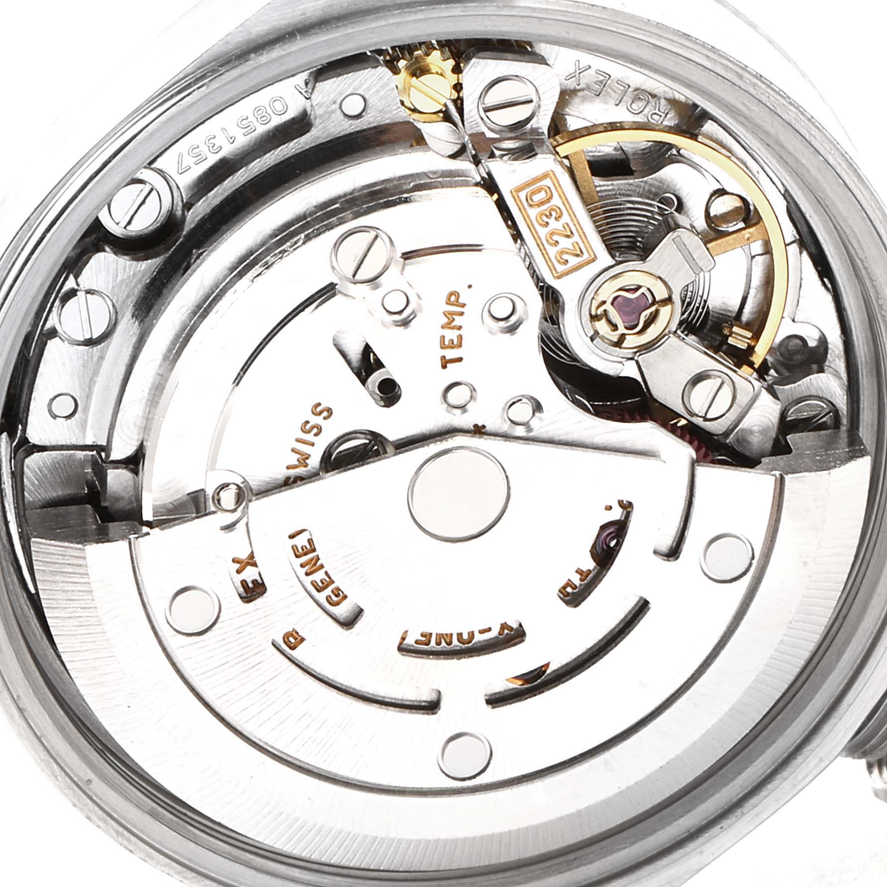 This is a detailed view of the internal mechanisms of a Rolex Oyster Perpetual 76030 Women's Stainless Steel Silver Dial 76030 Women's Stainless Steel Silver Dial watch, showcasing its intricate parts and movements.