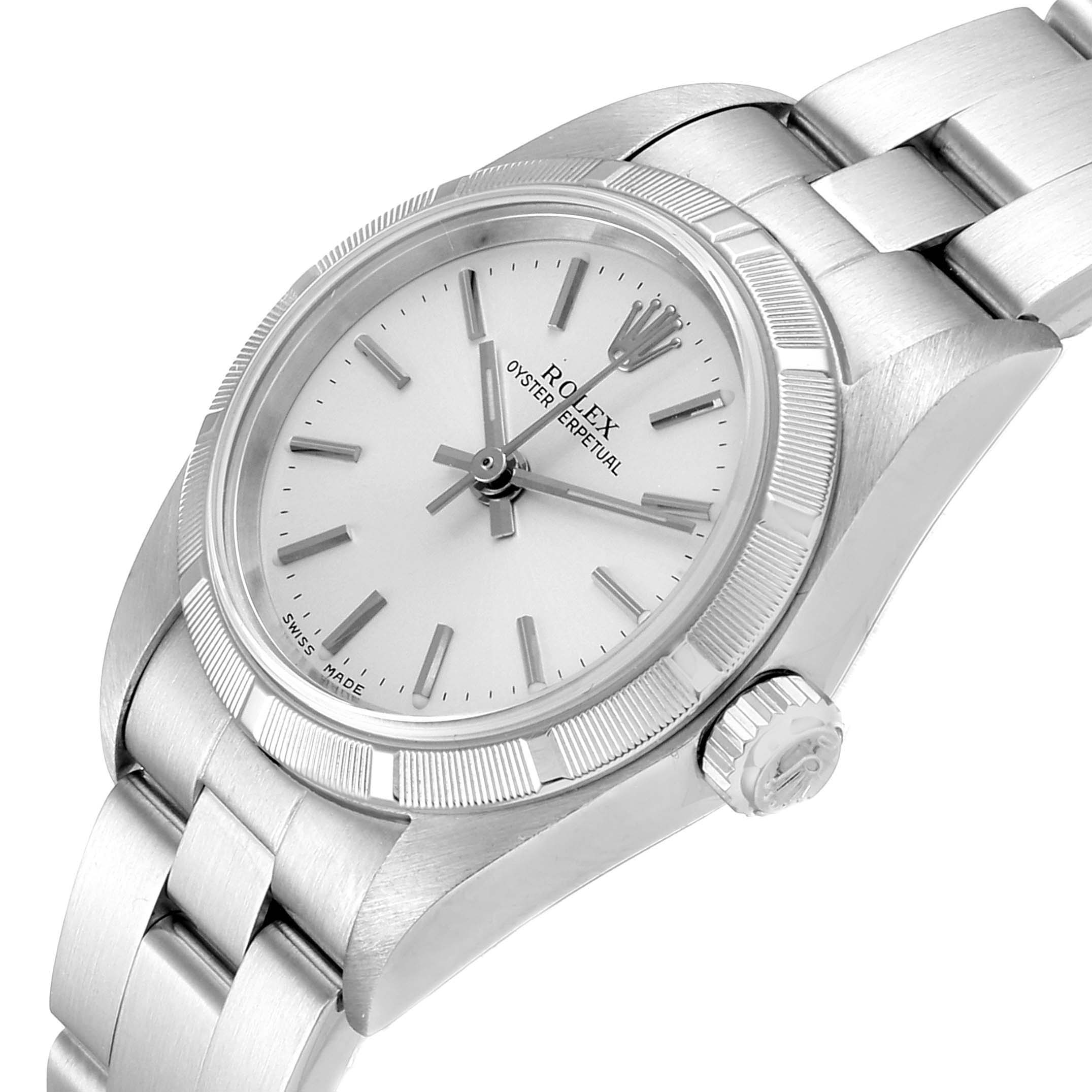 The image shows a close-up angle of the Rolex Oyster Perpetual 76030 Women's Stainless Steel Silver Dial 76030 Women's Stainless Steel Silver Dial watch, highlighting its dial, bezel, crown, and bracelet.