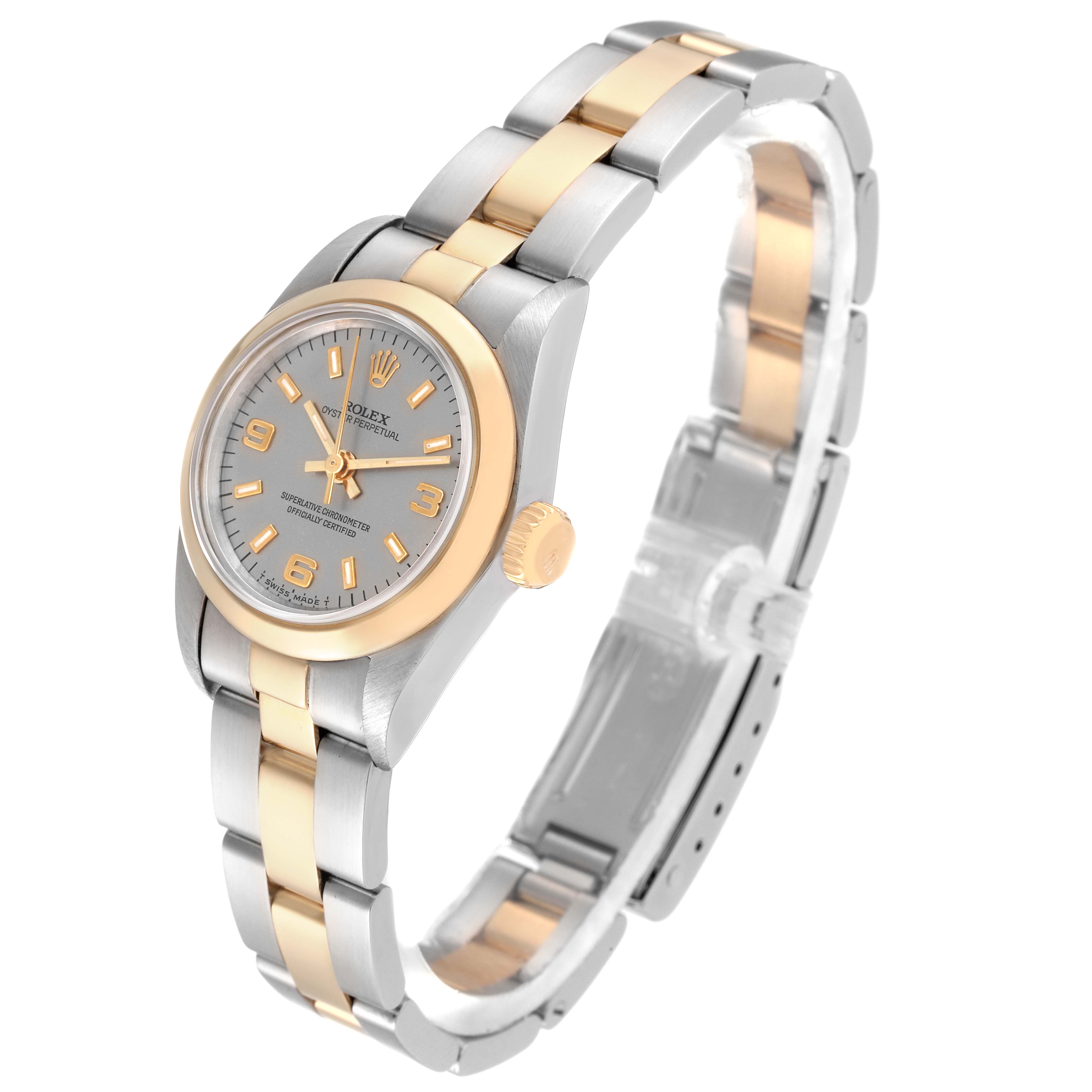 The image shows a side angle of the Rolex Oyster Perpetual 67183 Women's Steel and Gold (two tone) Grey Dial 67183 Women's Steel and Gold (two tone) Grey Dial watch, highlighting its two-tone metal band and crown.