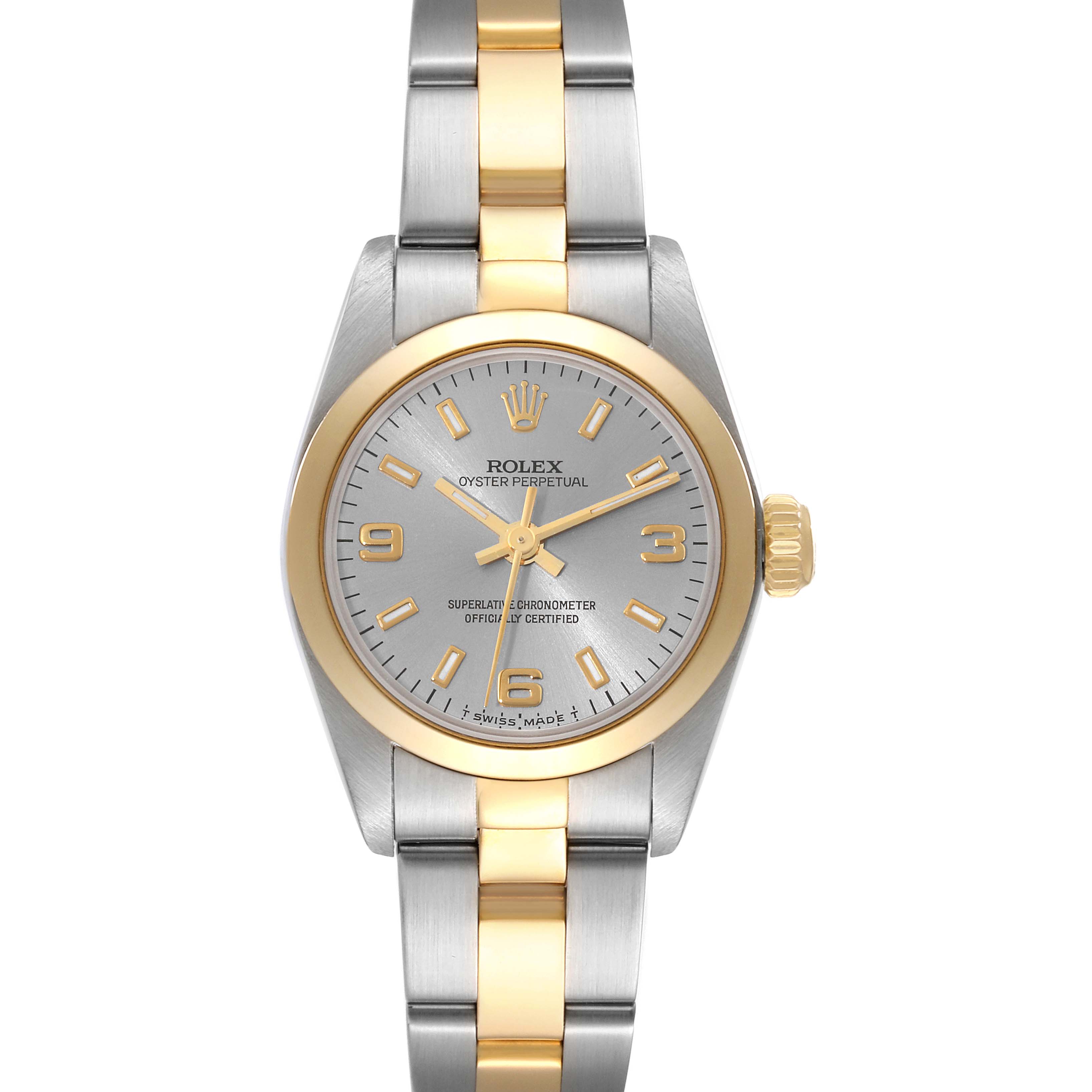 The image shows a front view of a Rolex Oyster Perpetual 67183 Women's Steel and Gold (two tone) Grey Dial 67183 Women's Steel and Gold (two tone) Grey Dial watch, highlighting its two-tone bracelet and silver dial.