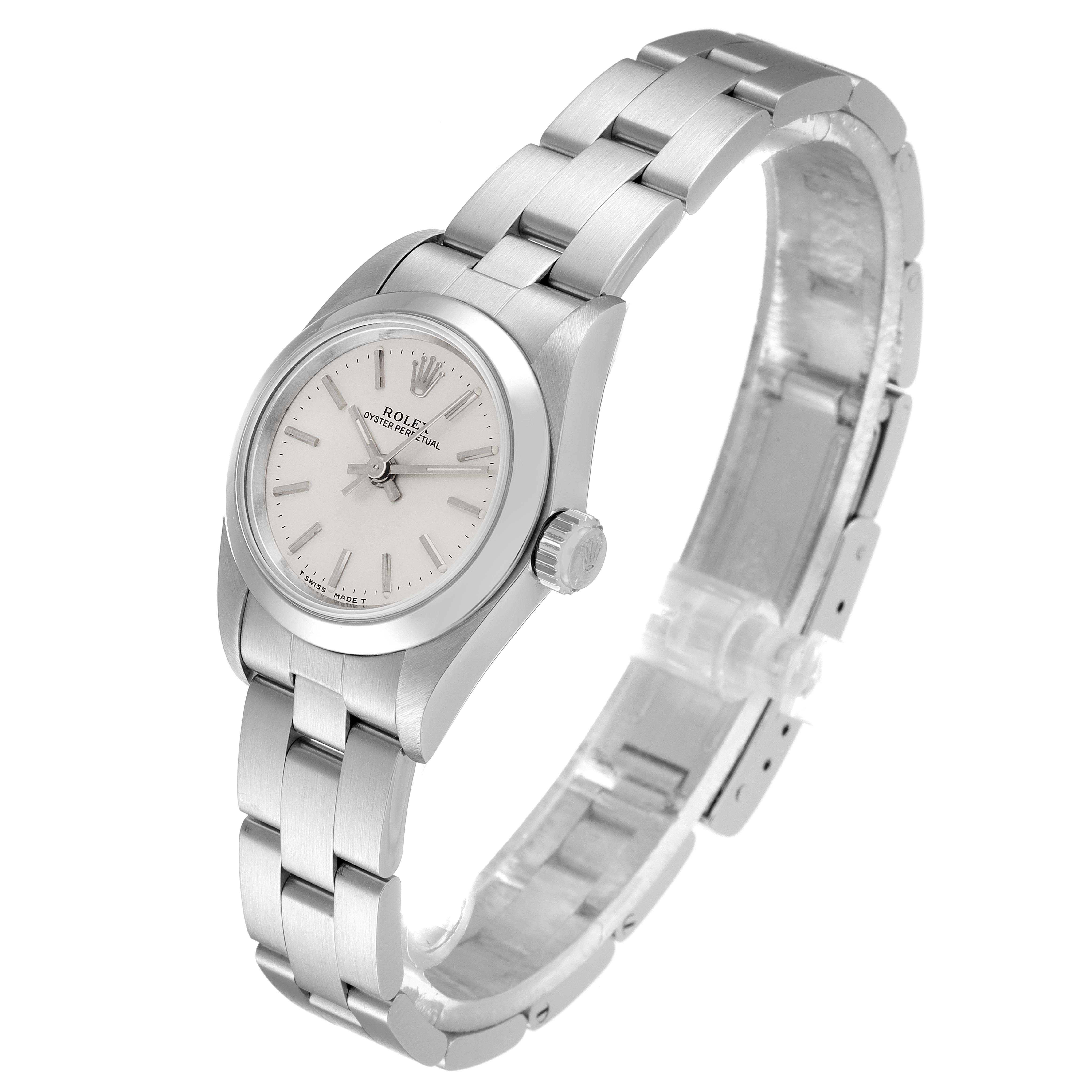 The image shows a Rolex Oyster Perpetual 67180 Women
s Stainless Steel Silver Dial 67180 Women
s Stainless Steel Silver Dial watch angled to display the face, bezel, crown, and bracelet.