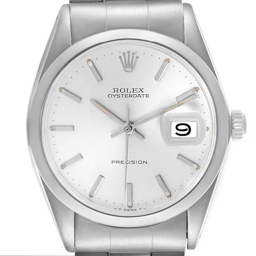 The Rolex Date watch is shown from a direct frontal angle, displaying the dial, bezel, crown, and part of the bracelet.