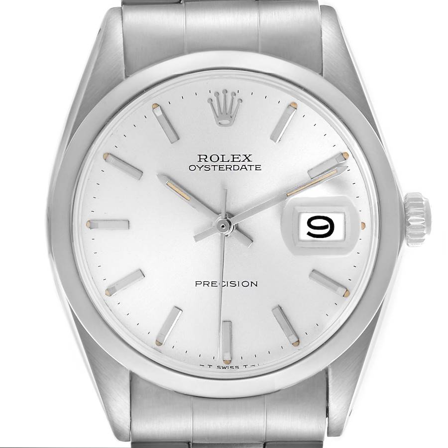 The Rolex Oysterdate Precision watch is shown from a front angle, highlighting the dial, hands, date window, and crown.