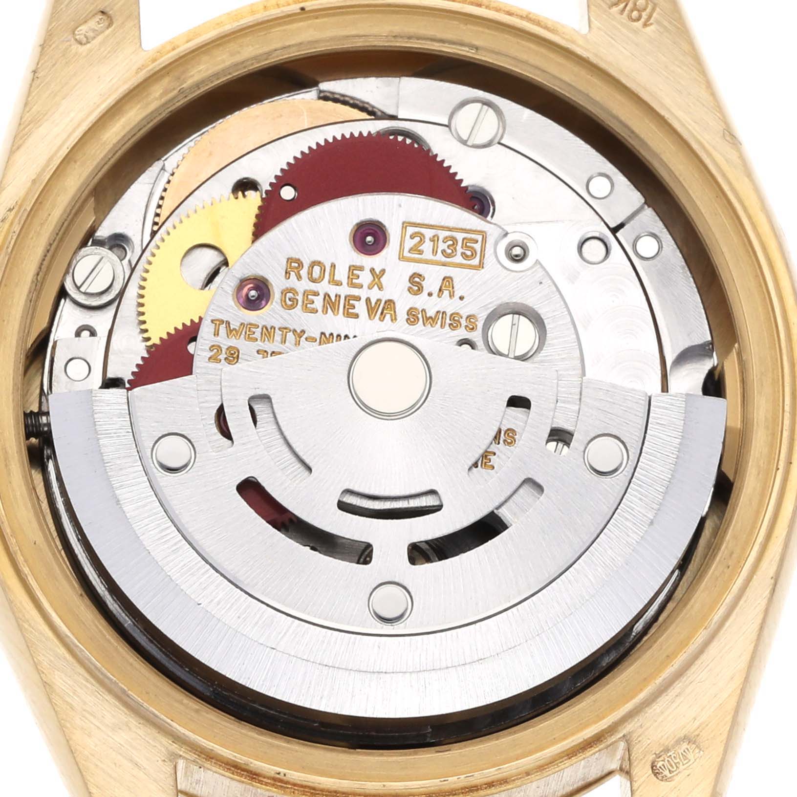 The image shows a close-up of the movement of a Rolex President 69178 Women's Yellow Gold Black Dial 69178 Women's Yellow Gold Black Dial watch, highlighting gears and the rotor.