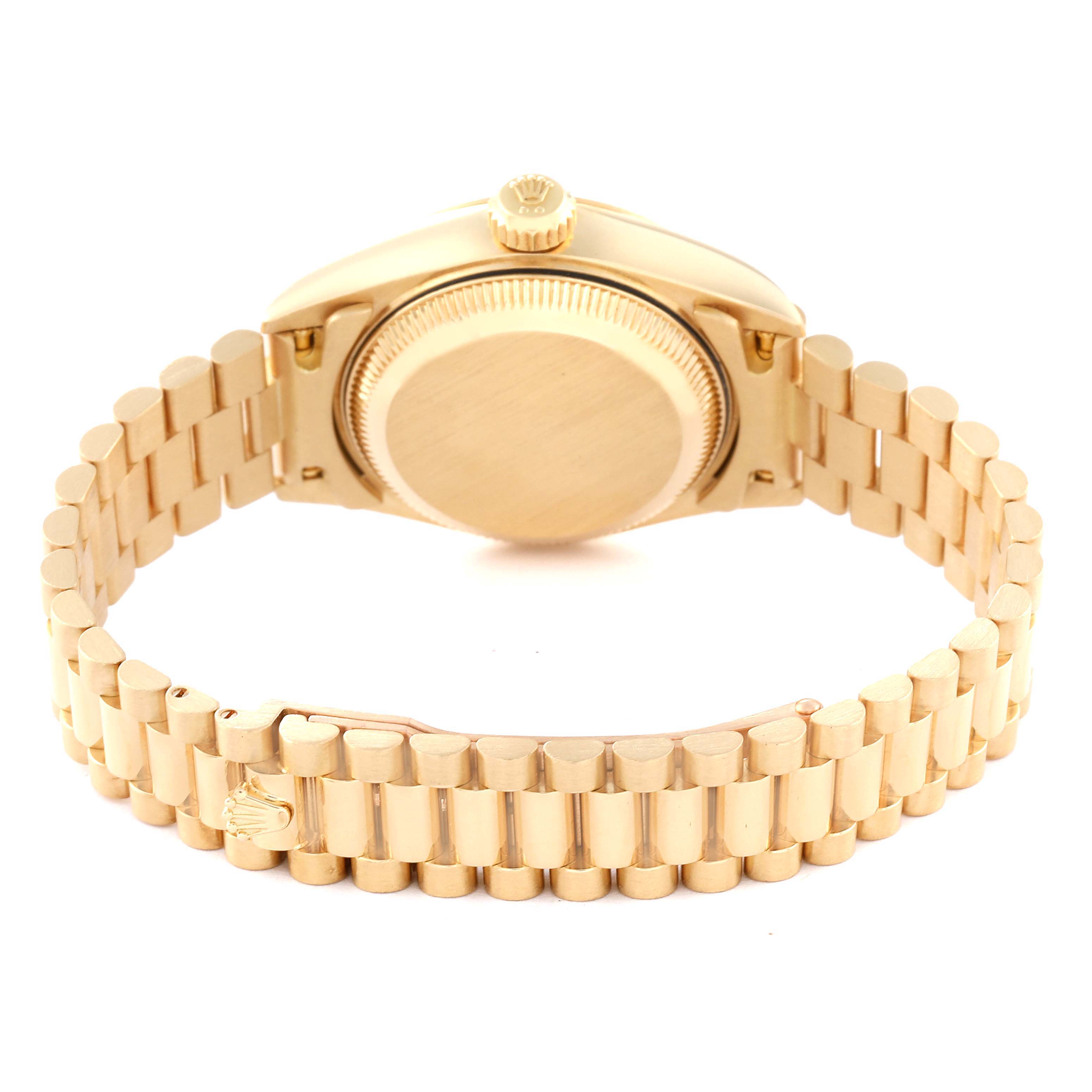 The image shows the back and bracelet of a President model Rolex watch from a rear angle.
