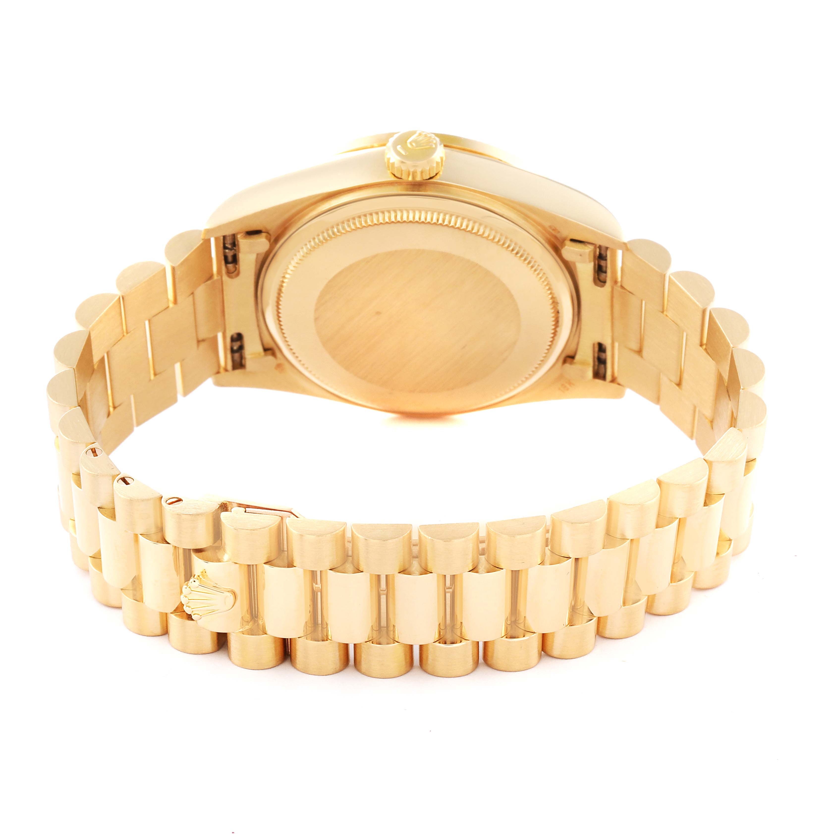 This image shows a Rolex President 18138 Men
s Yellow Gold Champagne Dial 18138 Men
s Yellow Gold Champagne Dial model watch from the rear, highlighting its gold bracelet and case back.