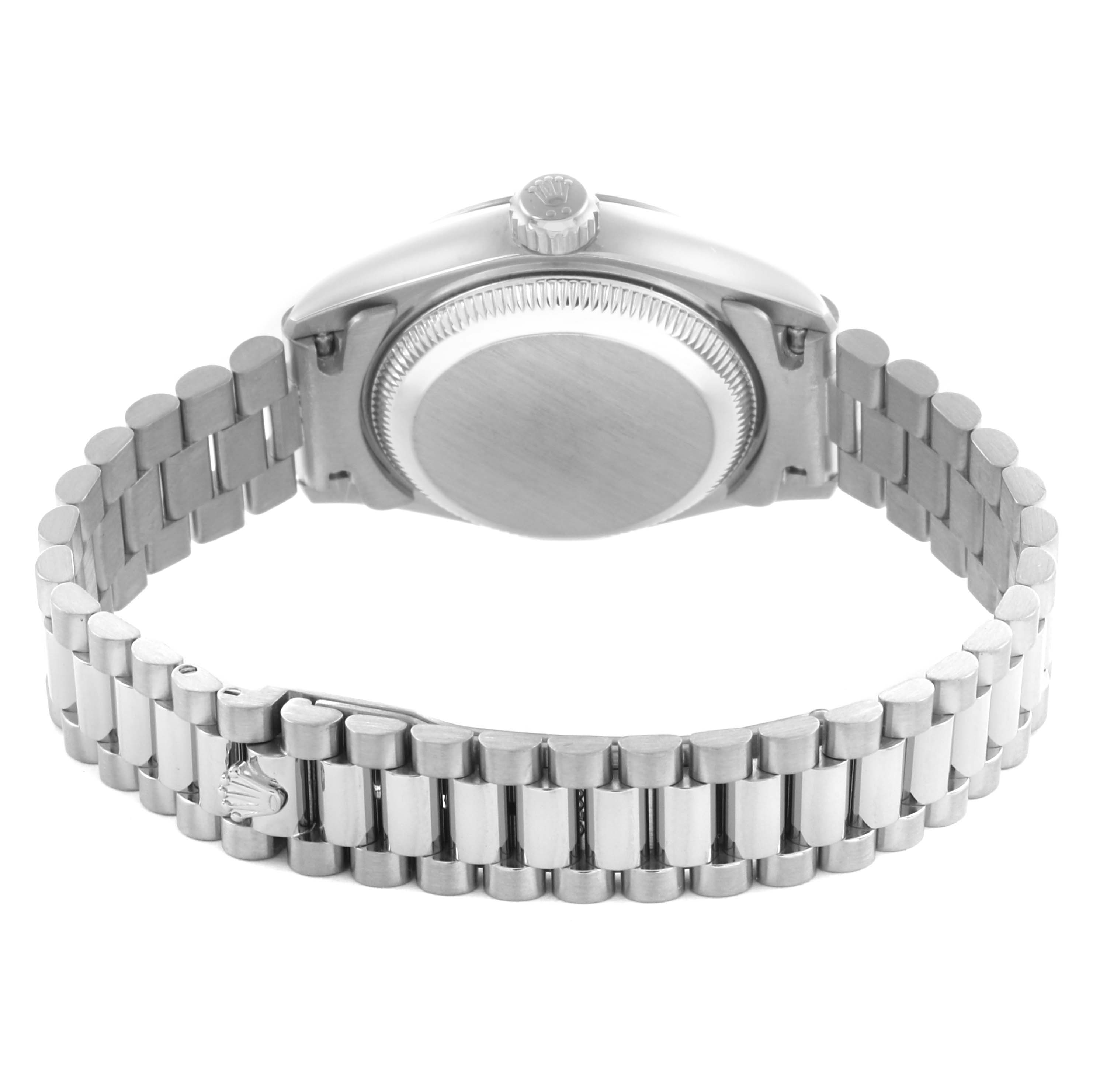 The Rolex President 79179 Women's White Gold Silver Dial 79179 Women's White Gold Silver Dial model is shown from the back, highlighting its clasp, bracelet, and case back.