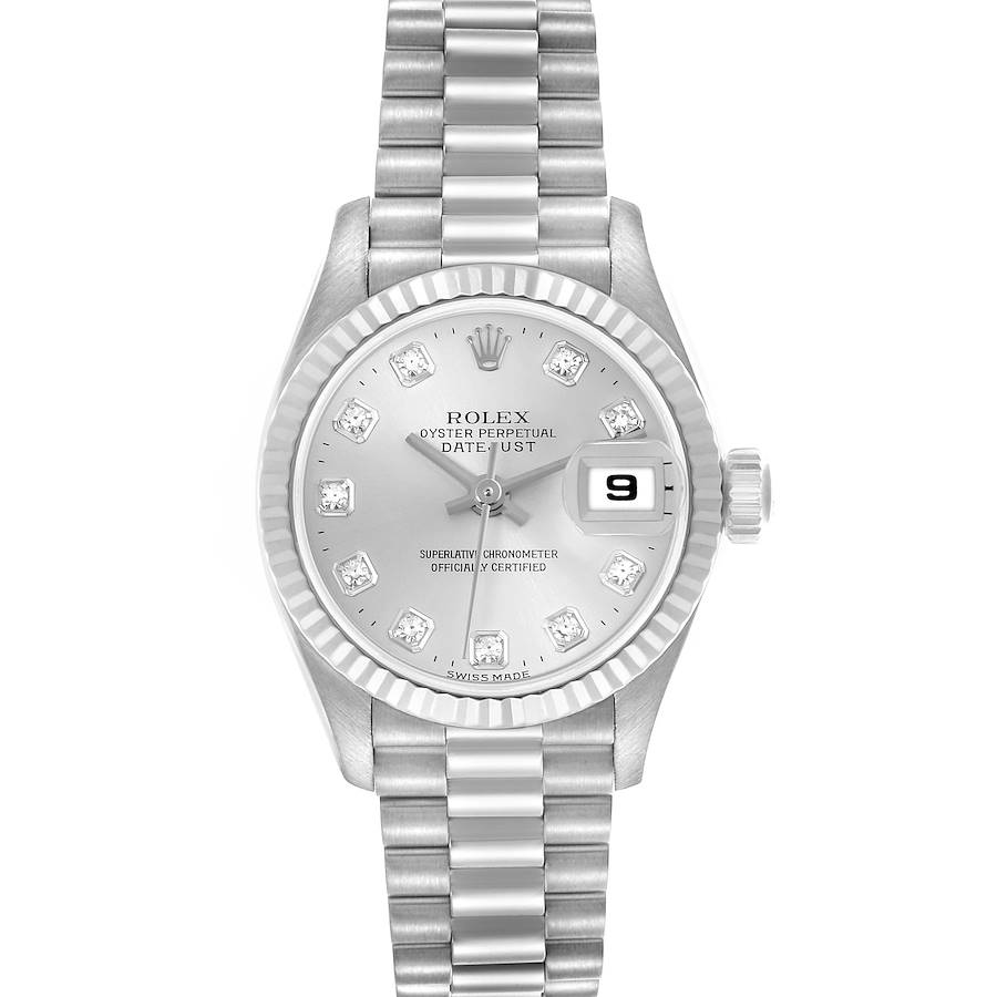 The Rolex President watch is shown from a top-down angle, highlighting its face, bezel, markers, and bracelet.