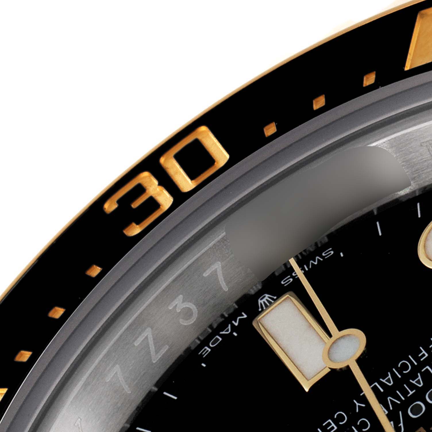 The image shows a close-up of the bezel and dial of a Rolex Sea-Dweller 126603 Men
s Steel and Gold (two tone) Black Dial 126603 Men
s Steel and Gold (two tone) Black Dial watch, focusing on the "30" minute marker.