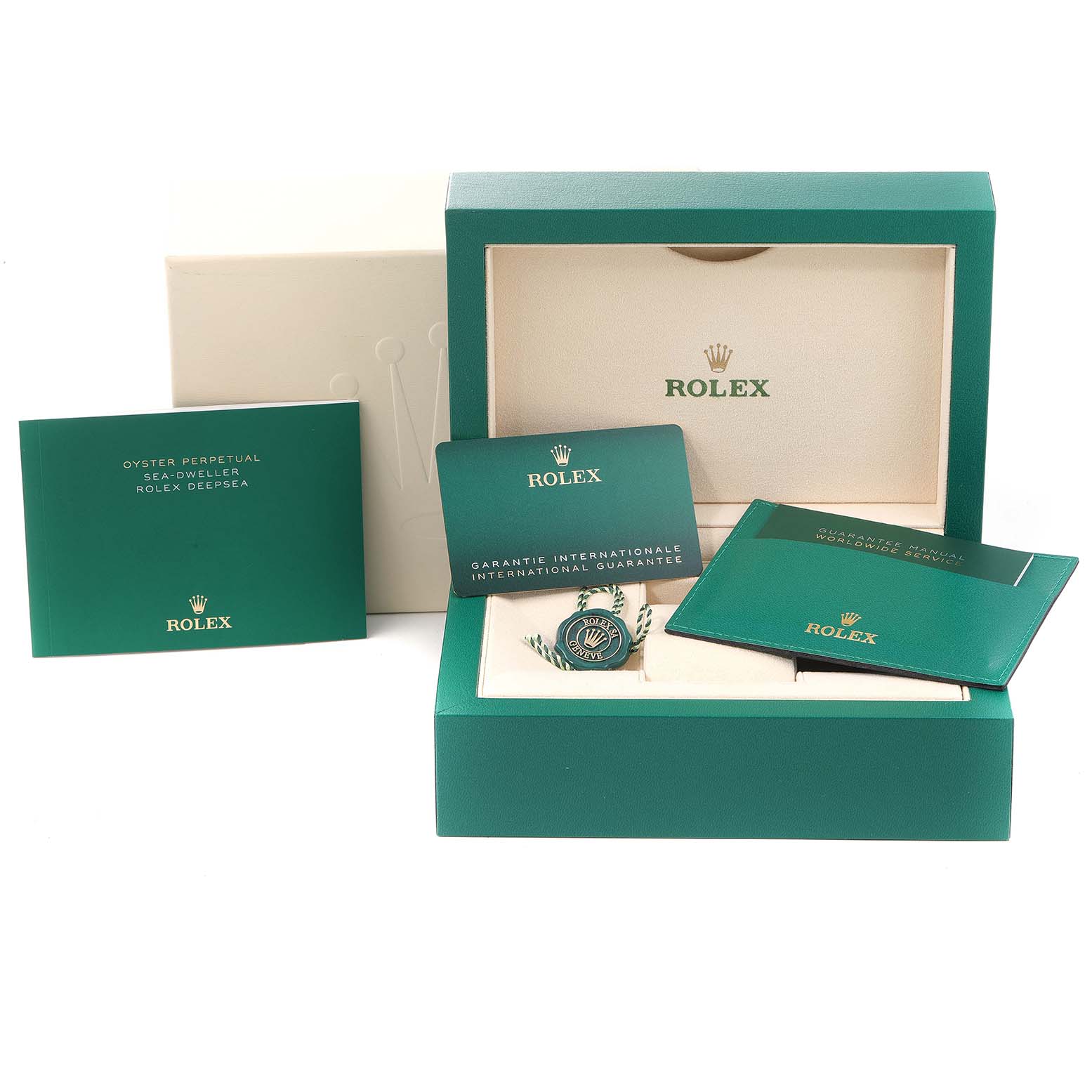 The image shows the packaging and accessories, including manuals and warranty cards, for the Rolex Sea-Dweller 126603 Men
s Steel and Gold (two tone) Black Dial 126603 Men
s Steel and Gold (two tone) Black Dial model.