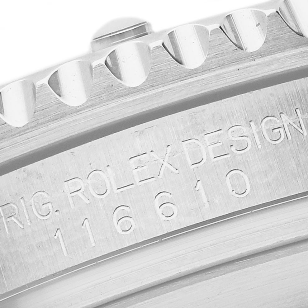 This close-up image of a Rolex Submariner 116610LN-0001 Men's Stainless Steel Black Dial 116610LN-0001 Men's Stainless Steel Black Dial shows the engraved model number on the case side and part of the bezel.