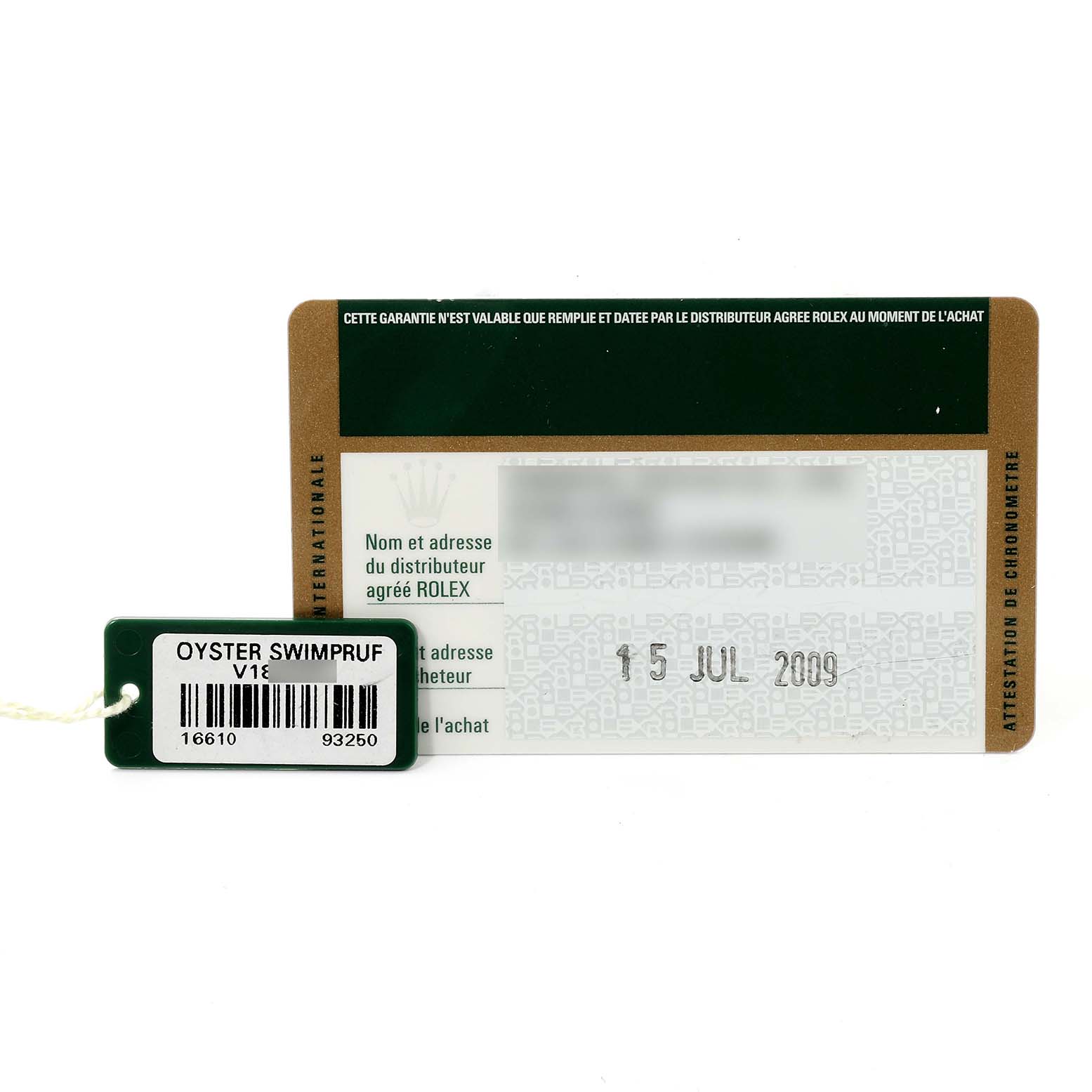 The image shows a warranty card and hangtag for a Rolex Submariner 16610 Men
s Stainless Steel Black Dial 16610 Men
s Stainless Steel Black Dial watch.