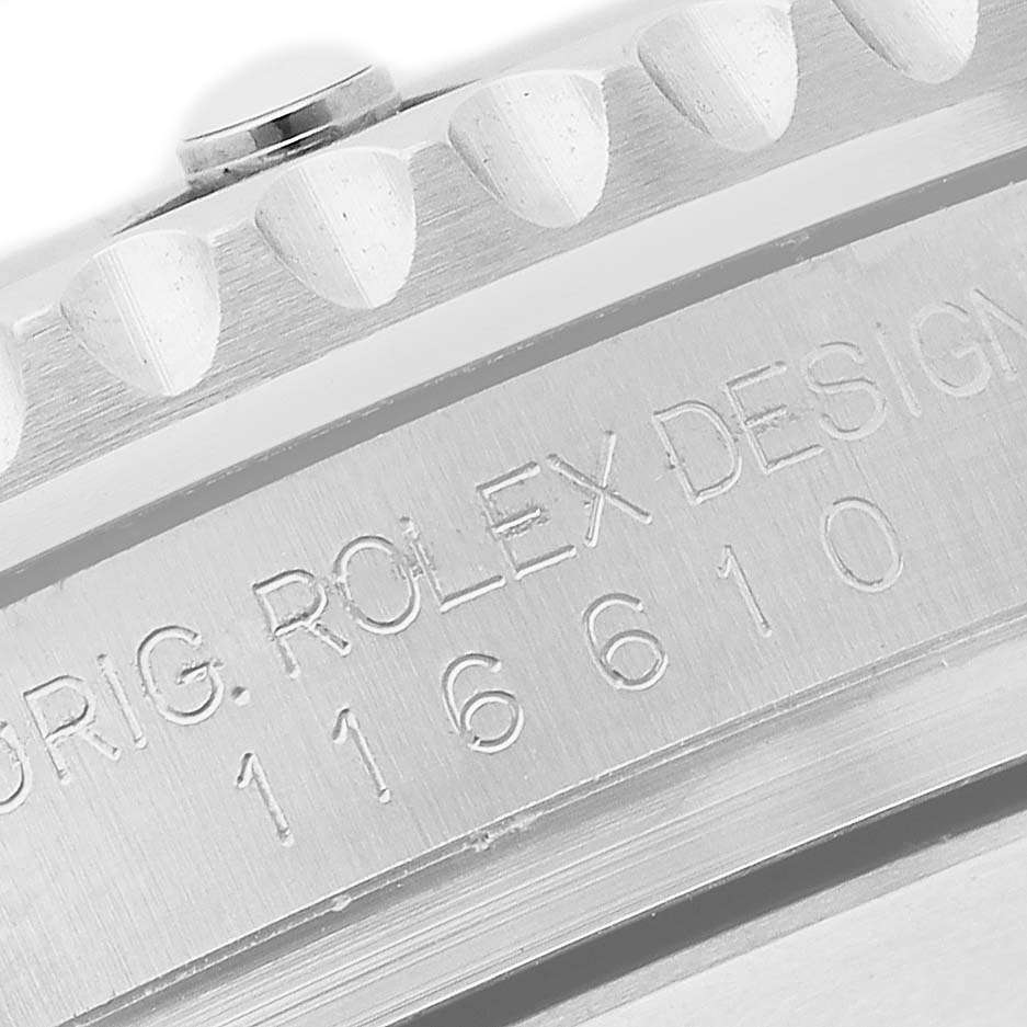 The image shows a close-up of the side of a Rolex Submariner 116610LN Men's Stainless Steel Black Dial watch, highlighting the engraved model number and bezel edge.