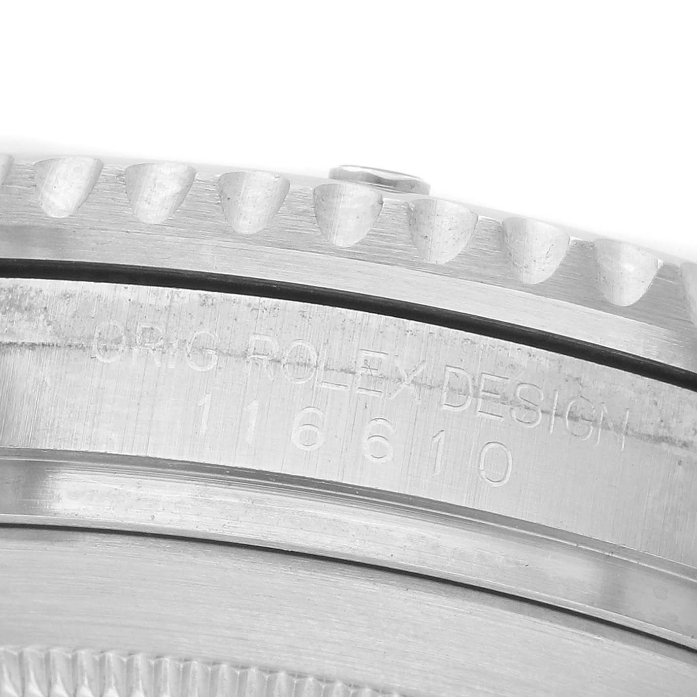 The image shows a close-up of the side of a Rolex Submariner 116610LN Men's Stainless Steel Black Dial, focusing on its engraved bezel and case.