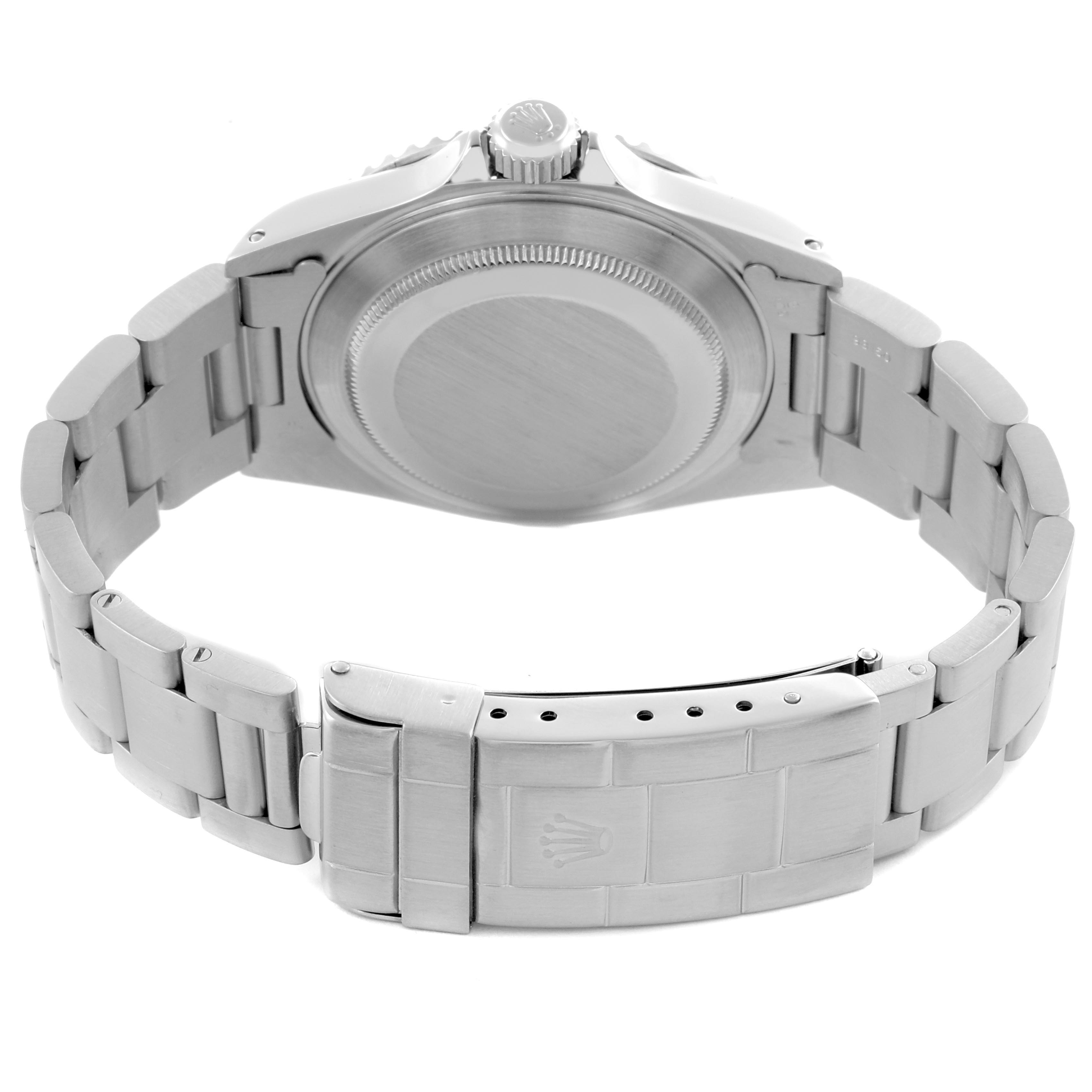 The image shows the back view of a Rolex Submariner 14060 Men's Stainless Steel Black Dial 14060 Men's Stainless Steel Black Dial, highlighting the case back, crown, and clasp of the bracelet.