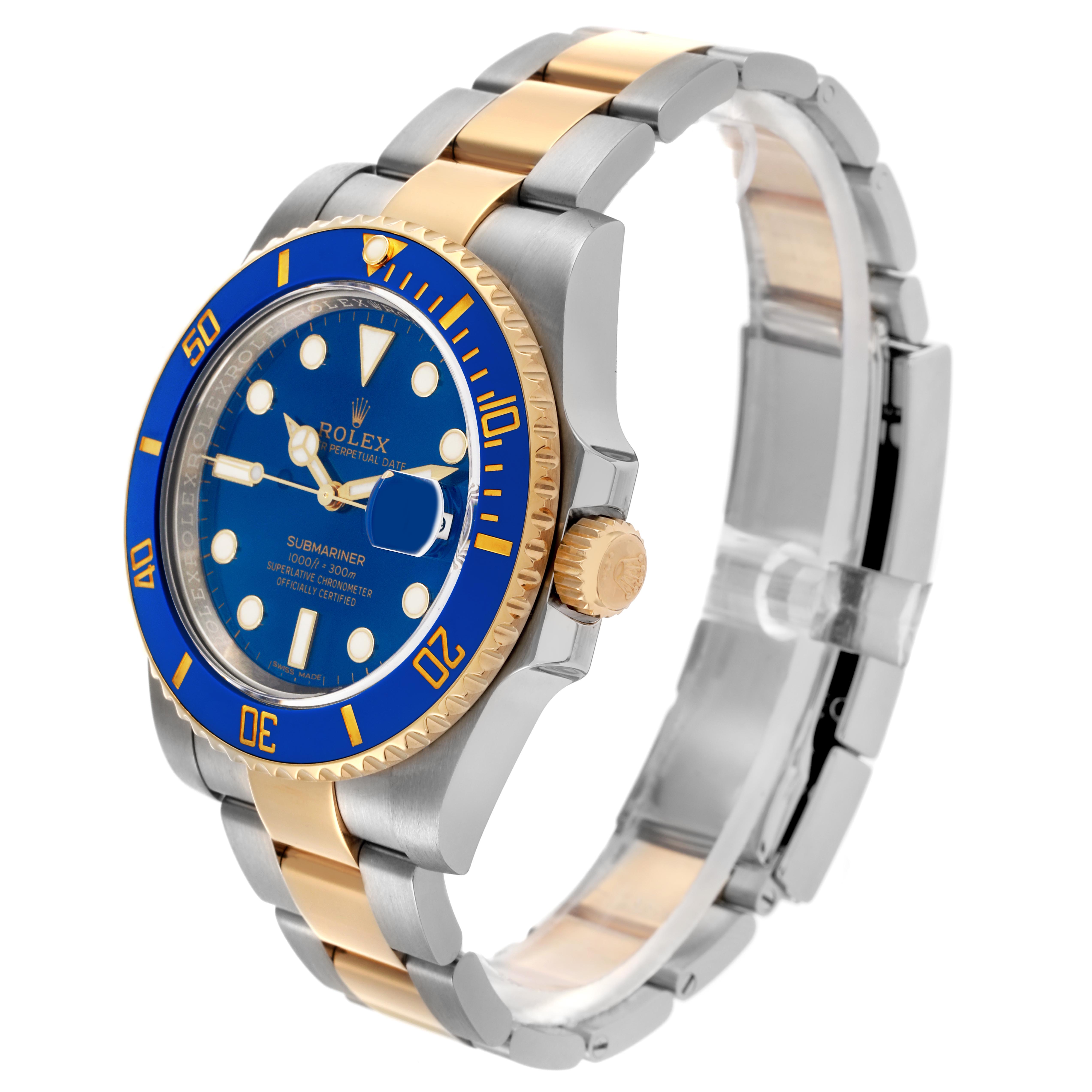 The Rolex Submariner 116613LB Men's Steel and Gold (two tone) Blue Dial 116613LB Men's Steel and Gold (two tone) Blue Dial watch is shown from a slightly angled side view, highlighting the bezel, dial, and bracelet.