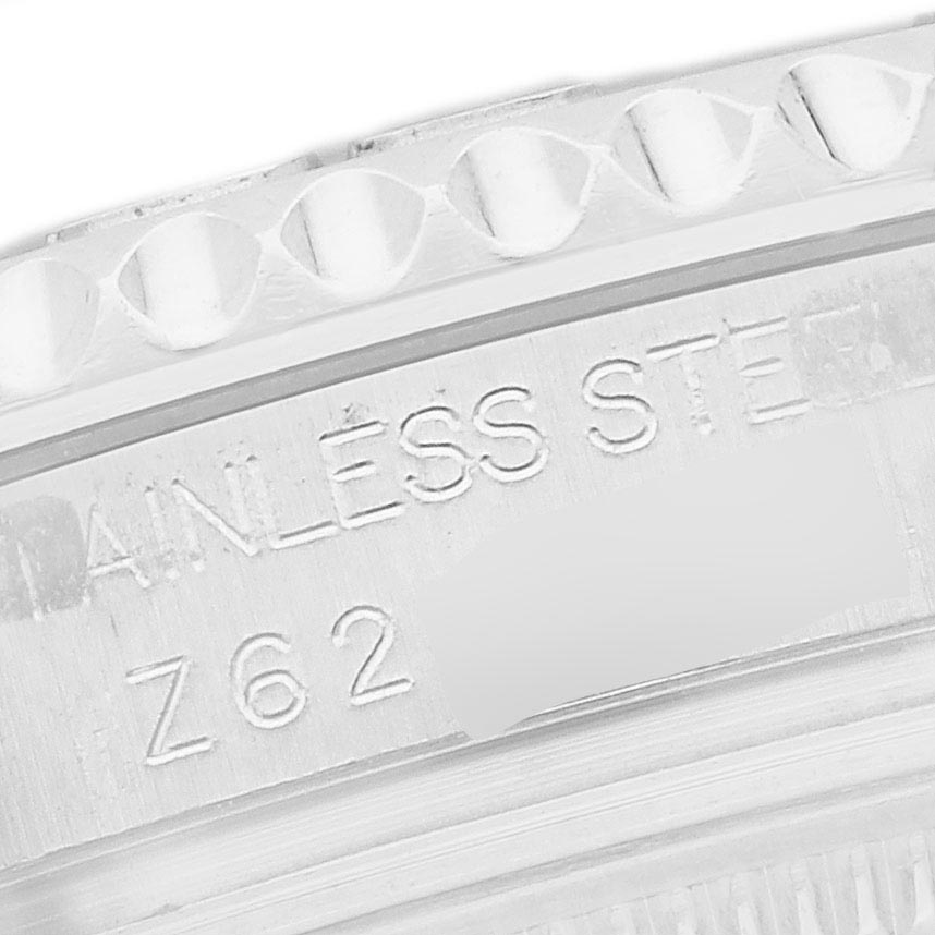 The image shows a close-up of the Rolex Yacht-Master 168622 Men
s Stainless Steel Silver Dial 168622 Men
s Stainless Steel Silver Dial’s bezel and engraved details like "STAINLESS STEEL".