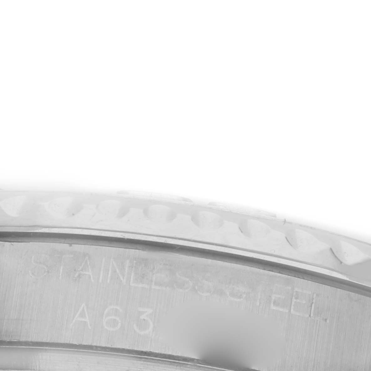 The image shows a close-up of the stainless steel casing of a Rolex Turn-o-Graph 168622 Men's Stainless Steel Silver Dial 168622 Men's Stainless Steel Silver Dial, focusing on the engraved text.