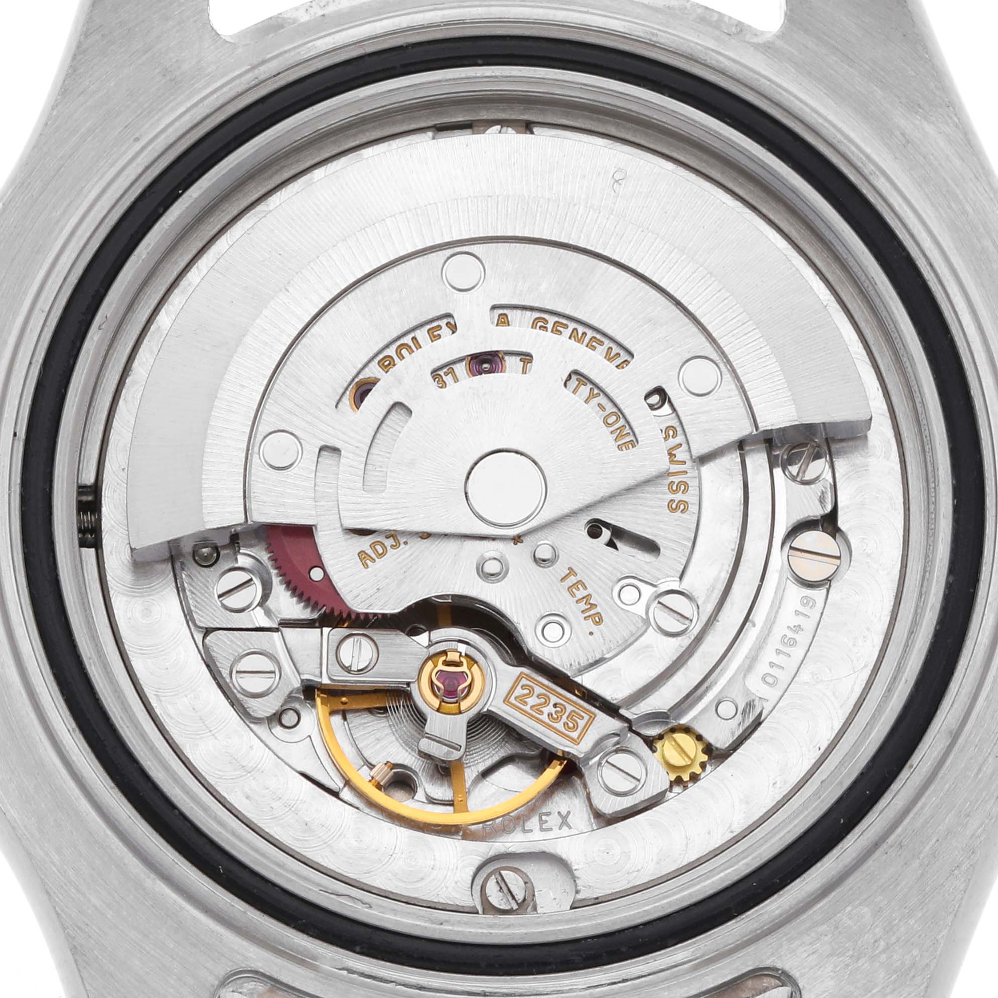 The image shows the movement of the Rolex Turn-o-Graph 168622 Men's Stainless Steel Silver Dial 168622 Men's Stainless Steel Silver Dial model from the back, displaying gears and inner mechanics.