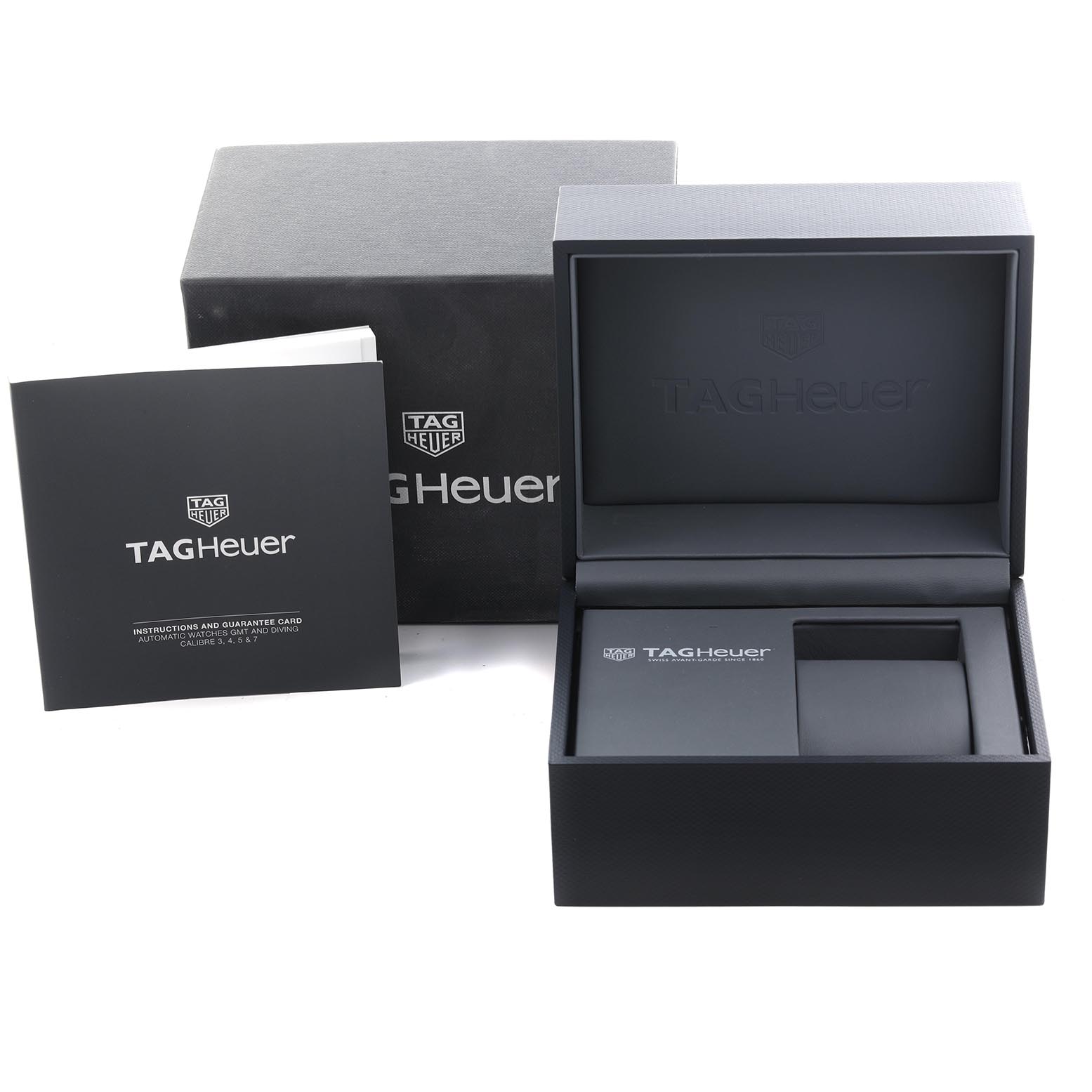 The image shows the packaging and accessories for a Tag Heuer Aquaracer WAY201B.BA0927 Men's Stainless Steel Blue Dial WAY201B.BA0927 Men's Stainless Steel Blue Dial, including the box and instruction manual.