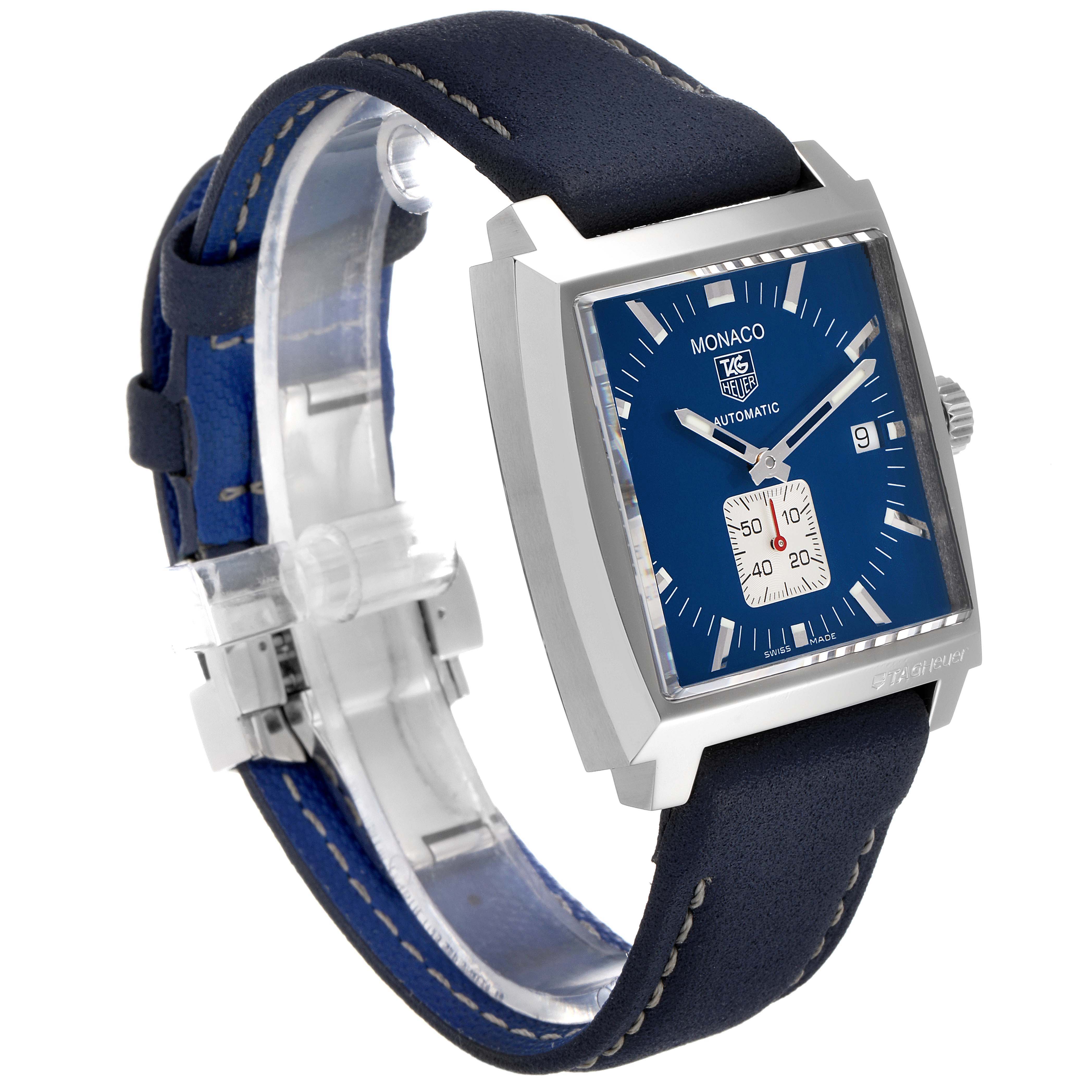 The image shows a Tag Heuer Monaco WW2111.FC6204 Men's Stainless Steel Blue Dial WW2111.FC6204 Men's Stainless Steel Blue Dial watch at a three-quarter angle, displaying its blue dial, square case, and dark leather strap.