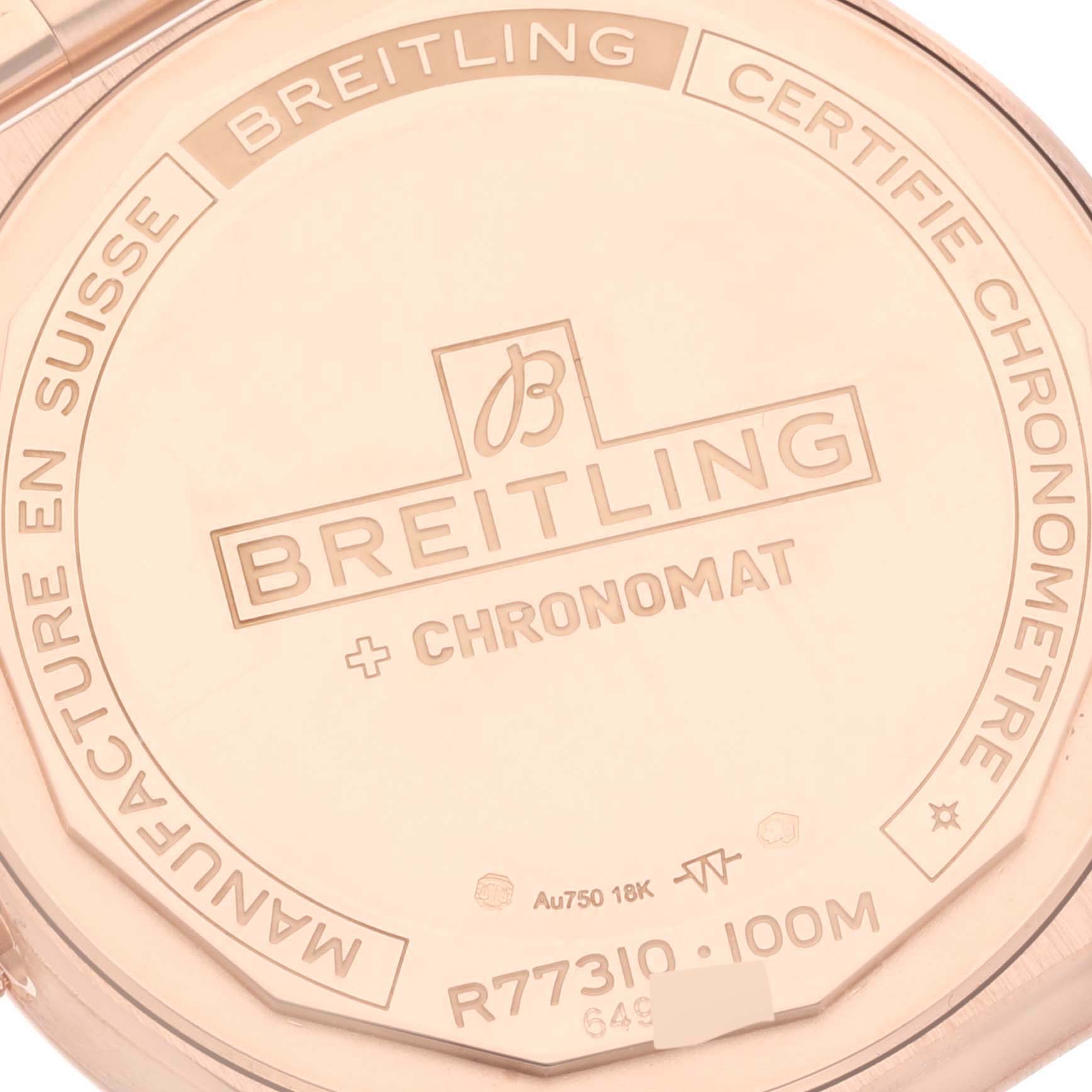 The image shows the back case of the Breitling R77310101A1R1 Women's Rose Gold White Dial R77310101A1R1 Women's Rose Gold White Dial Chronomat 32 R77310 Ladies Watch, highlighting the brand engraving and model details.