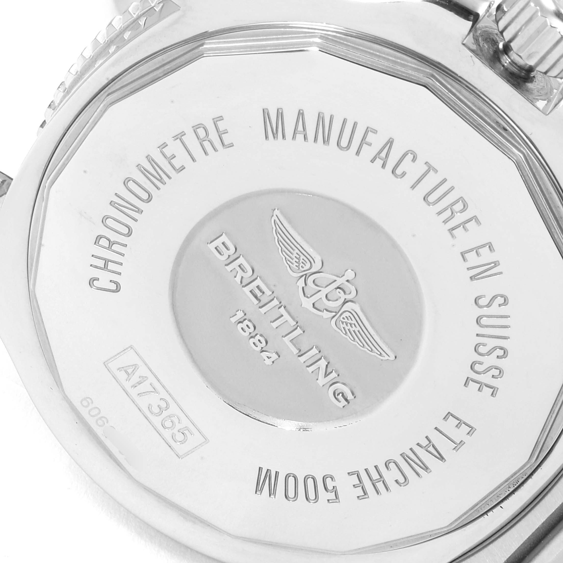 The image shows the back casing of a Breitling Superocean A17365 Men's Stainless Steel Blue Dial A17365 Men's Stainless Steel Blue Dial watch, highlighting engravings and the crown.