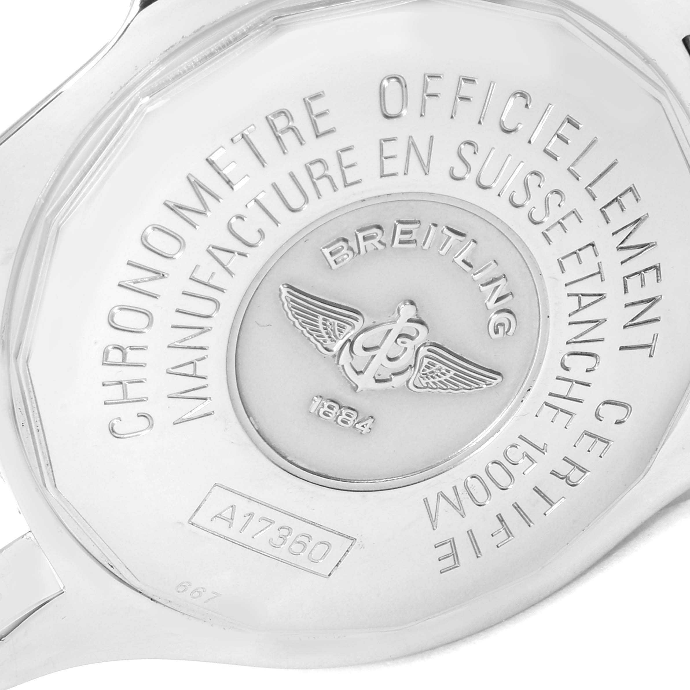 The image shows the back case of a Breitling Superocean A17360 Men's Stainless Steel Black Dial A17360 Men's Stainless Steel Black Dial watch, displaying engraved text and logo details.