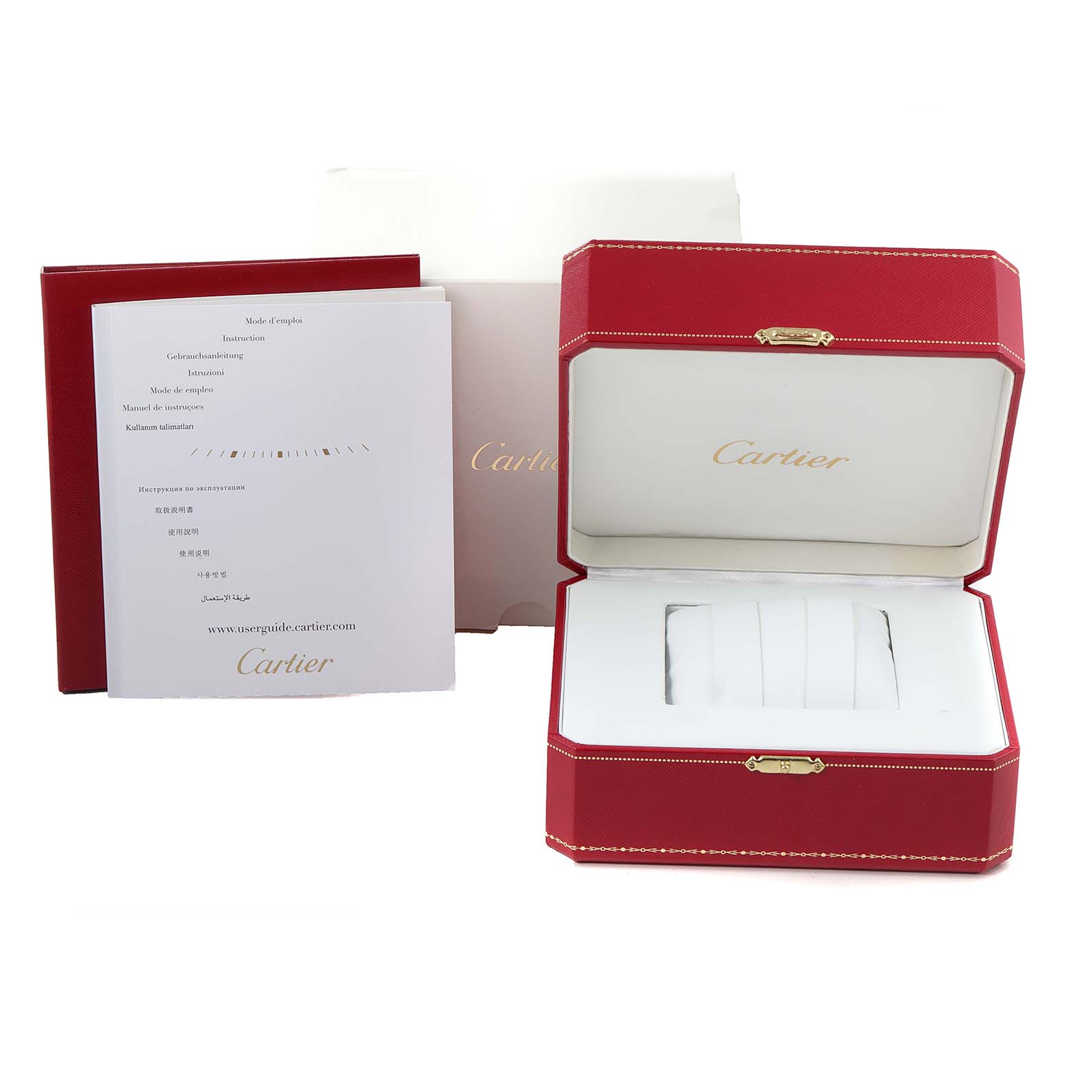 The image shows the packaging, manuals, and red presentation box for the Ballon Bleu model by Cartier.